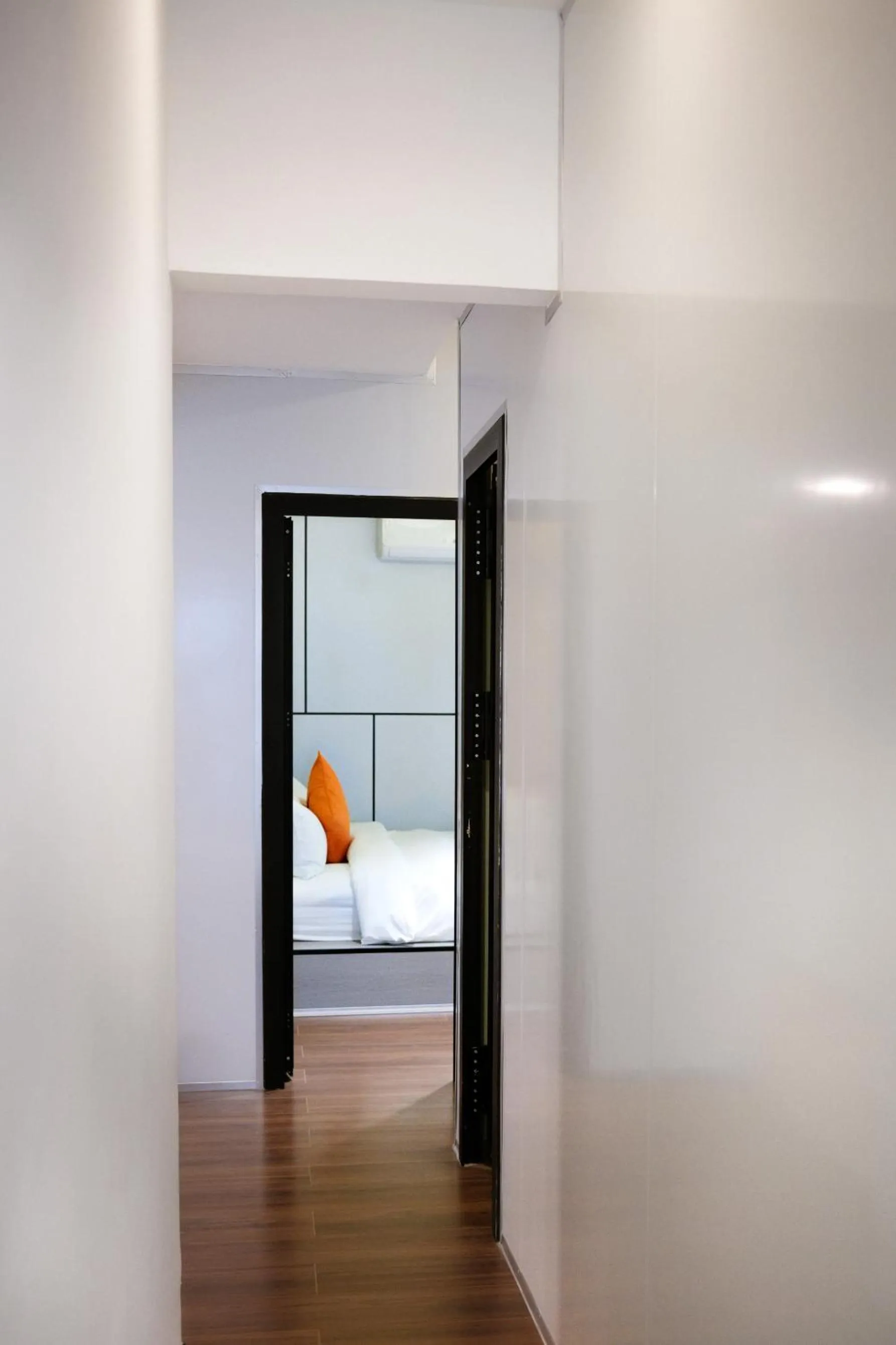 Bed in Metrolux City Contemporary Hotel