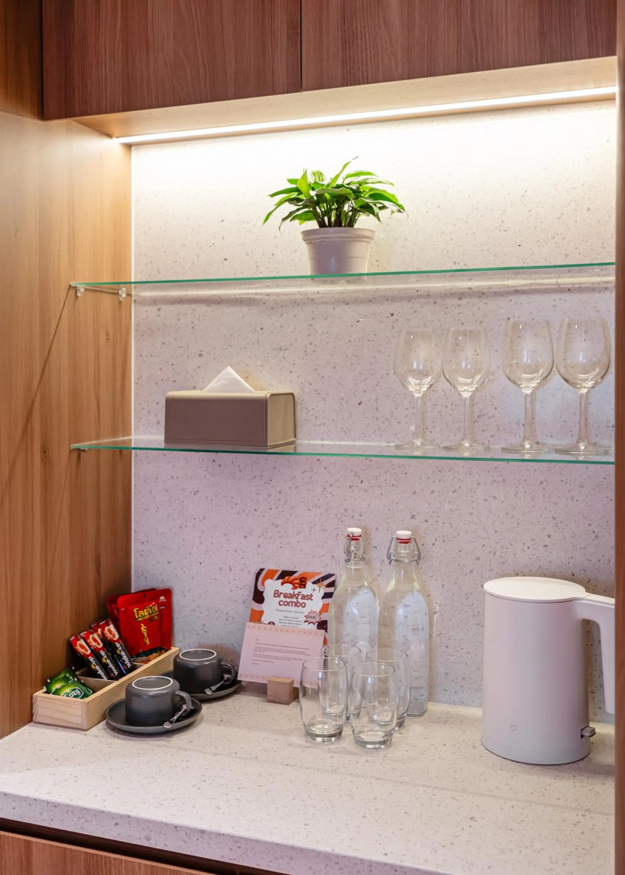 Kitchen or kitchenette in Metrolux City Contemporary Hotel