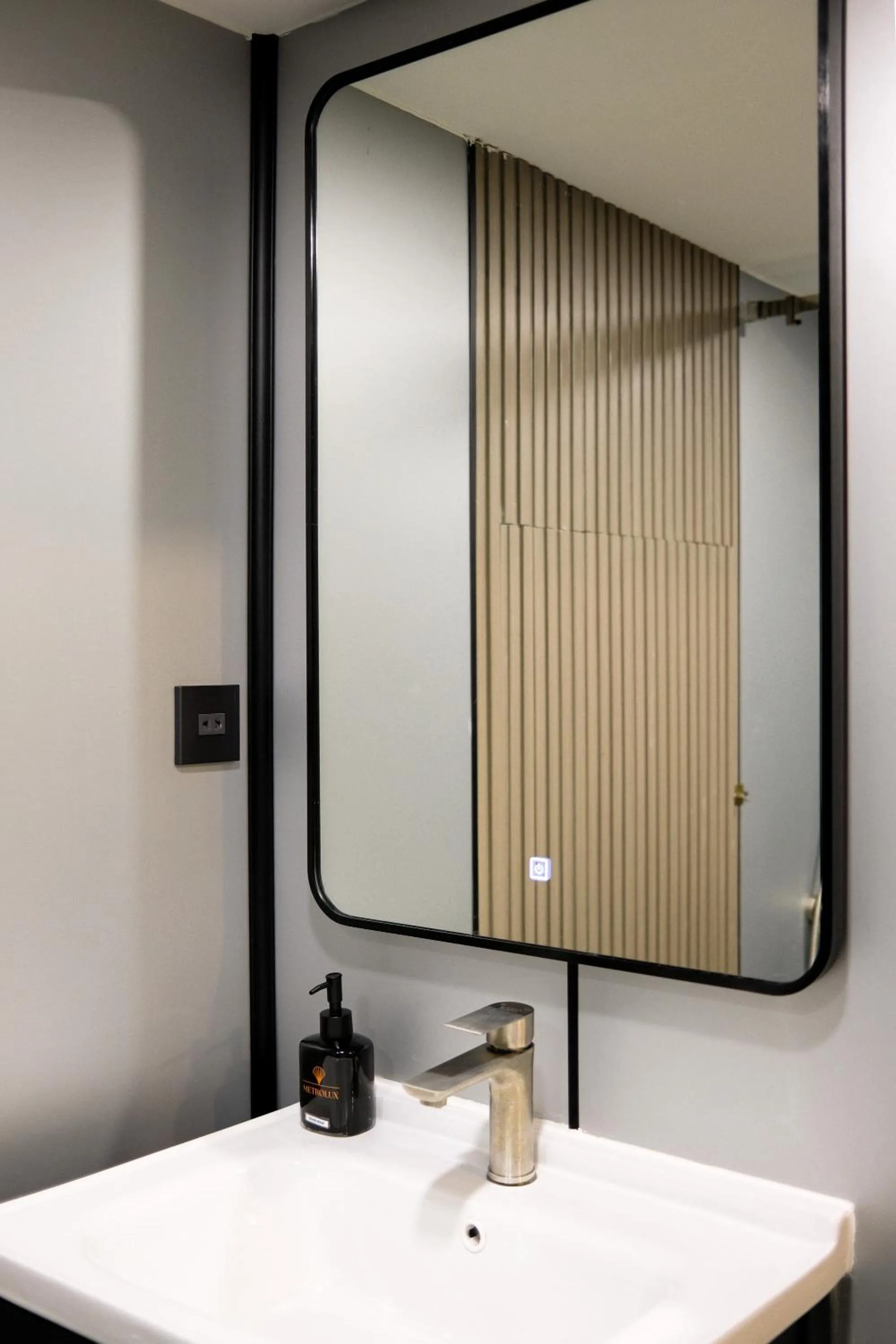 Bathroom in Metrolux City Contemporary Hotel