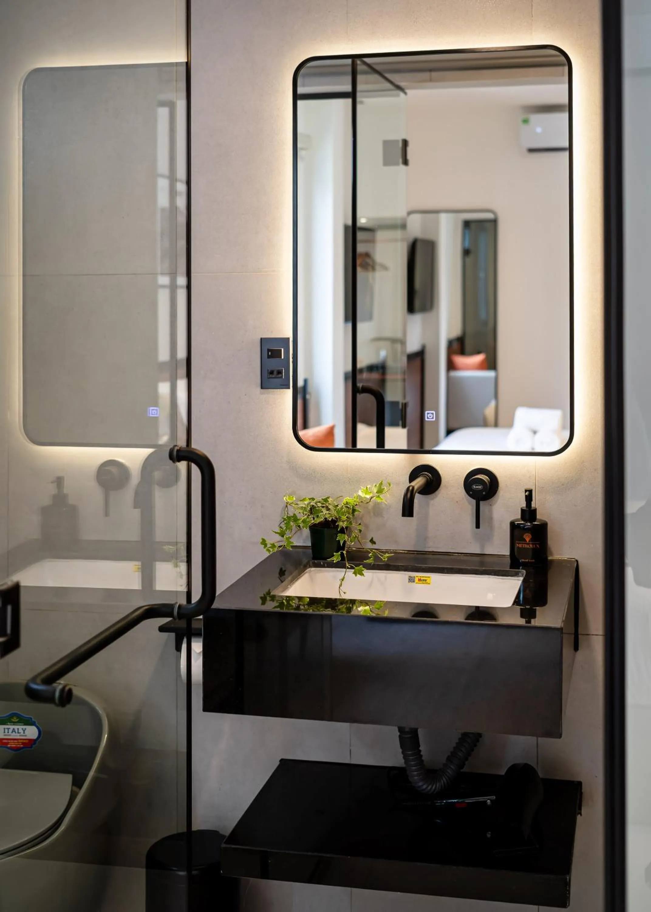 Bathroom in Metrolux City Contemporary Hotel