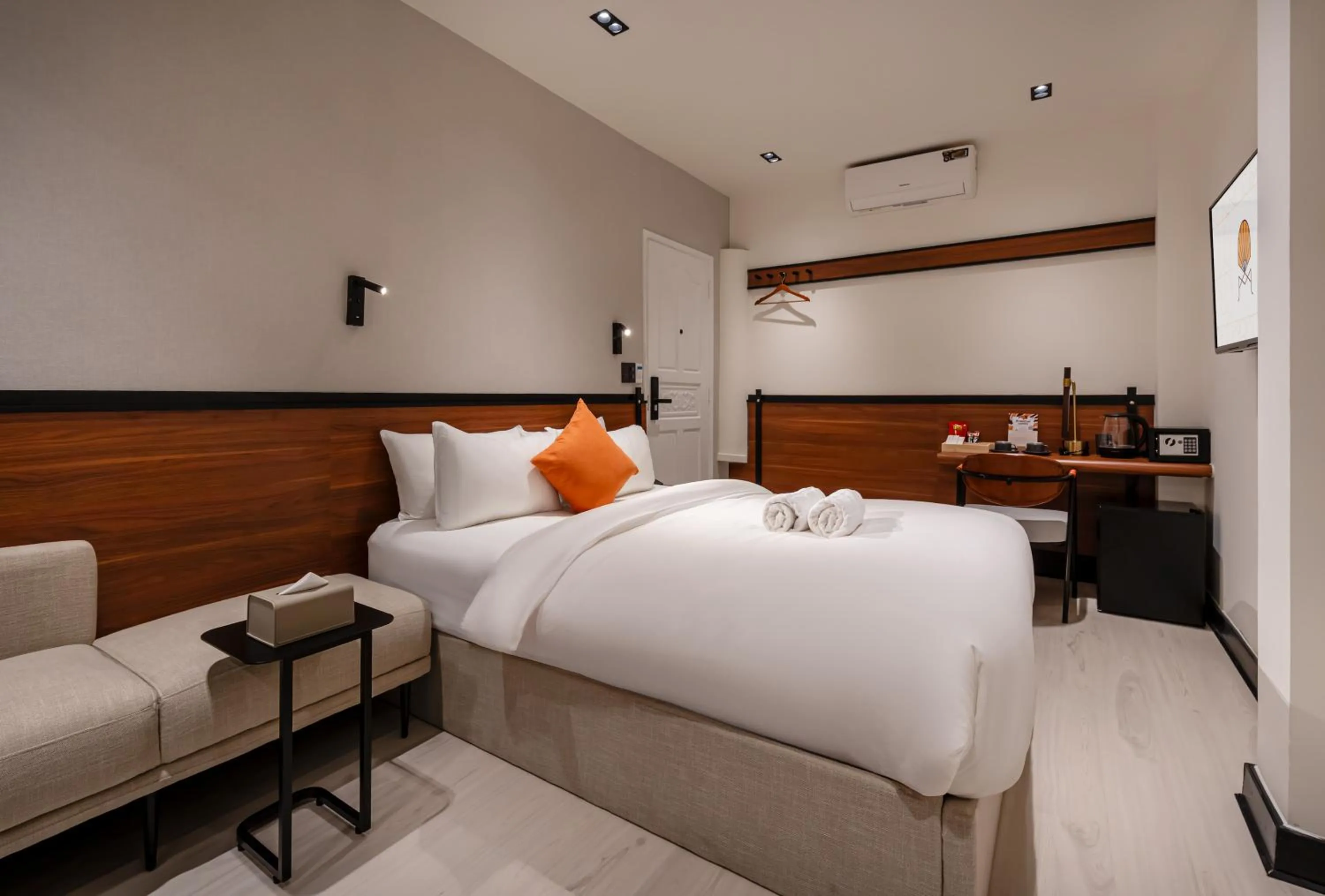 Bed in Metrolux City Contemporary Hotel