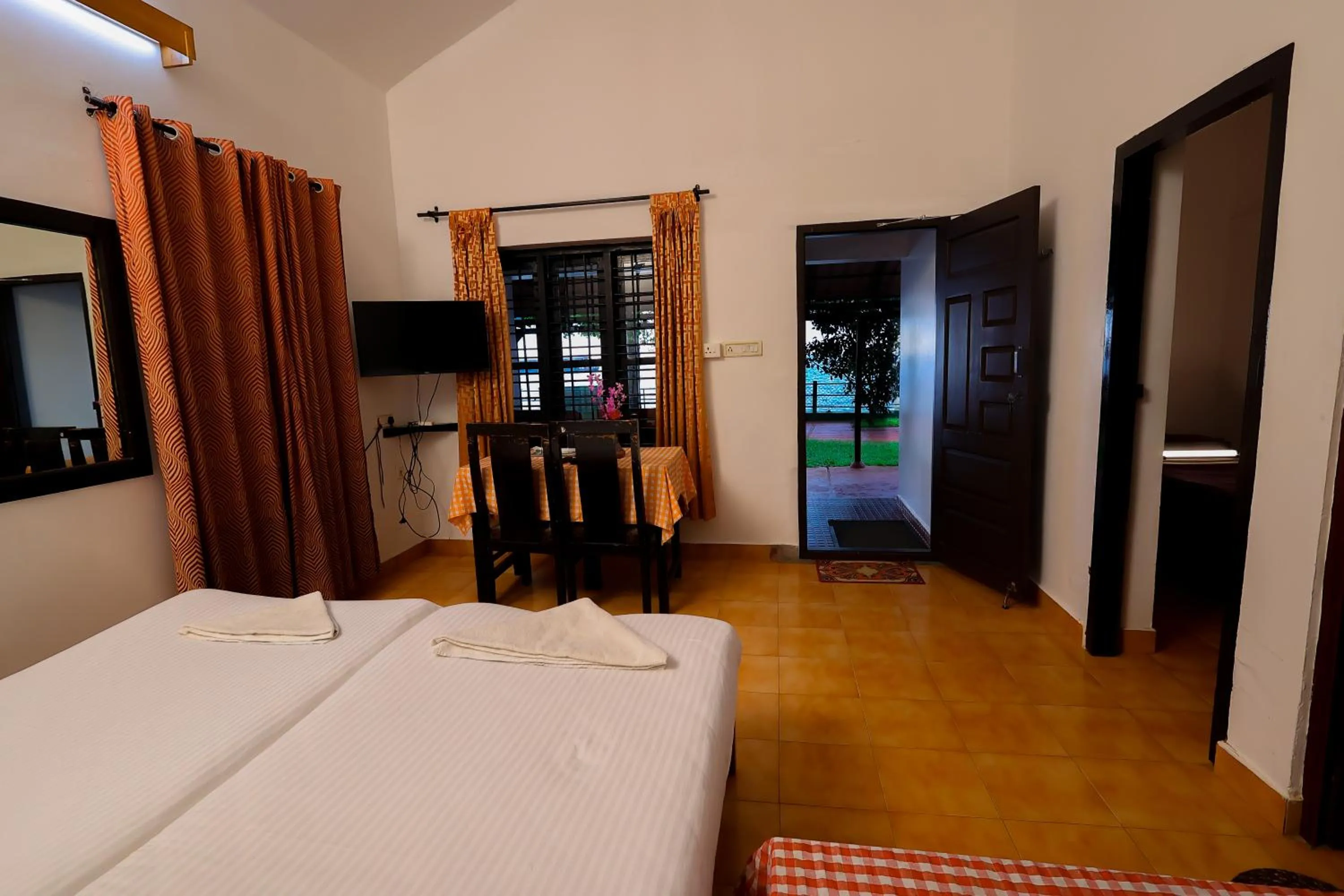 Bedroom, Bed in ILLIKKALAM Lakeside Cottages Kumarakom Kerala