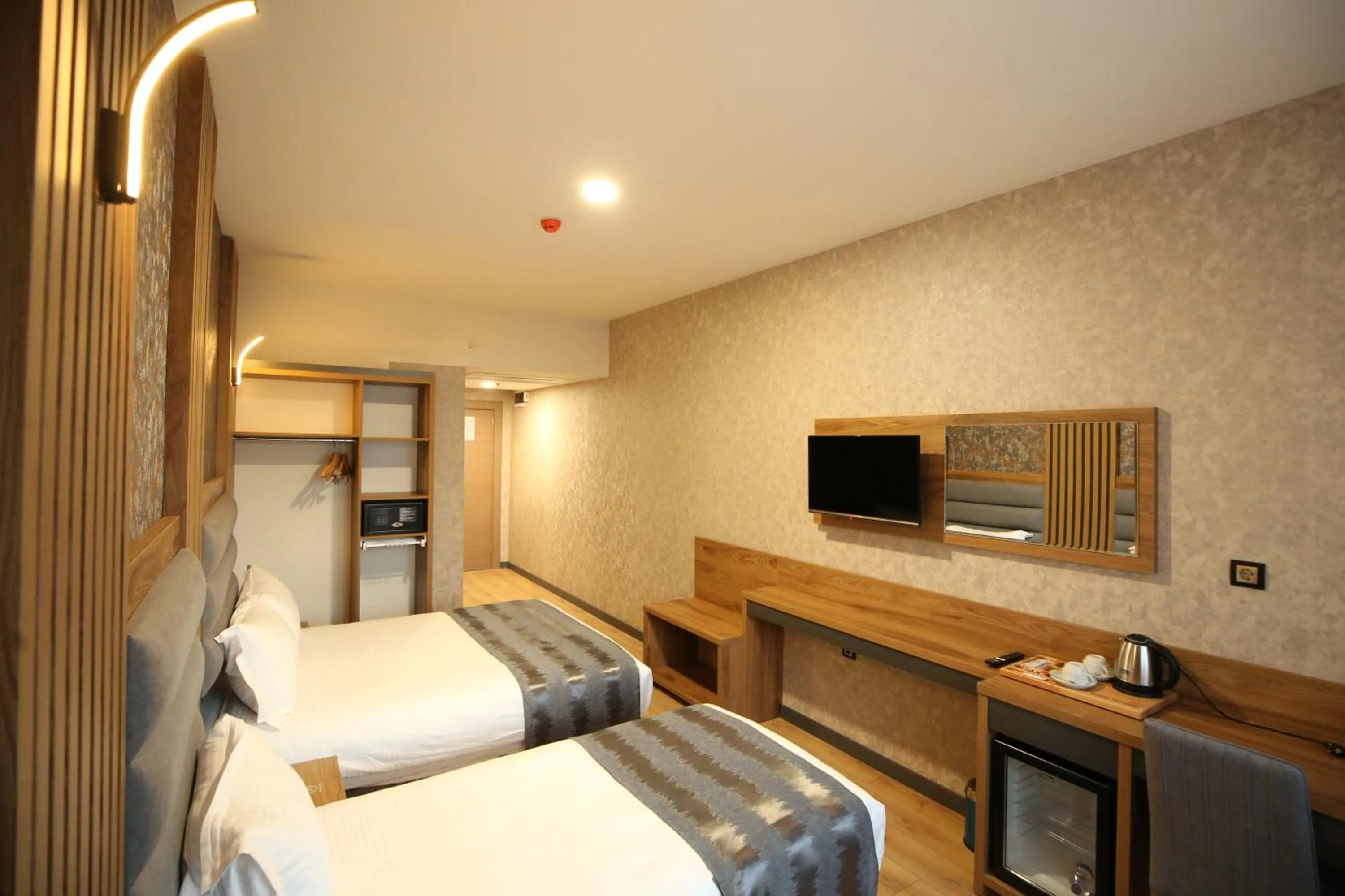 Bed in Büpa Plus Hotel