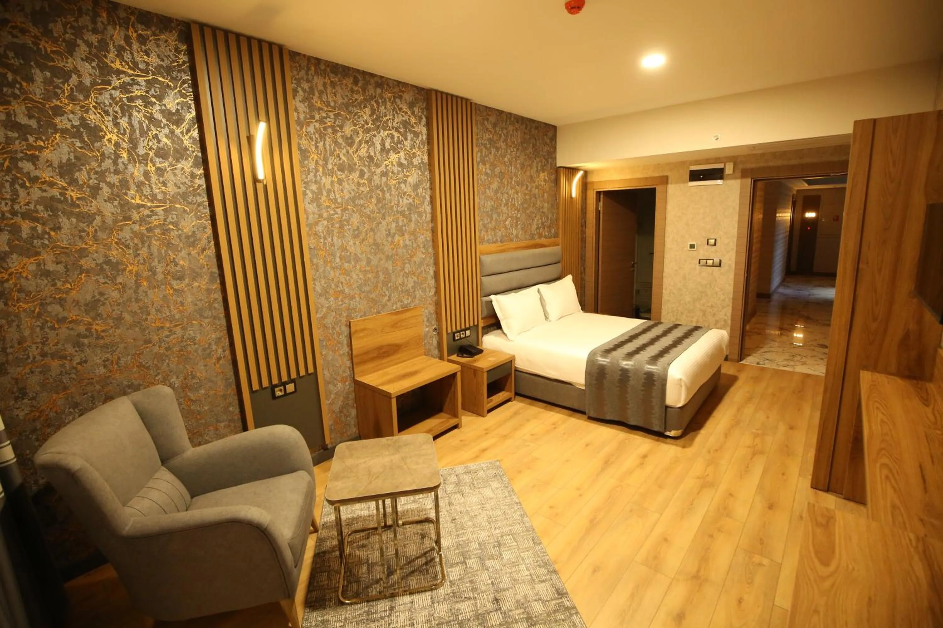 Bed in Büpa Plus Hotel
