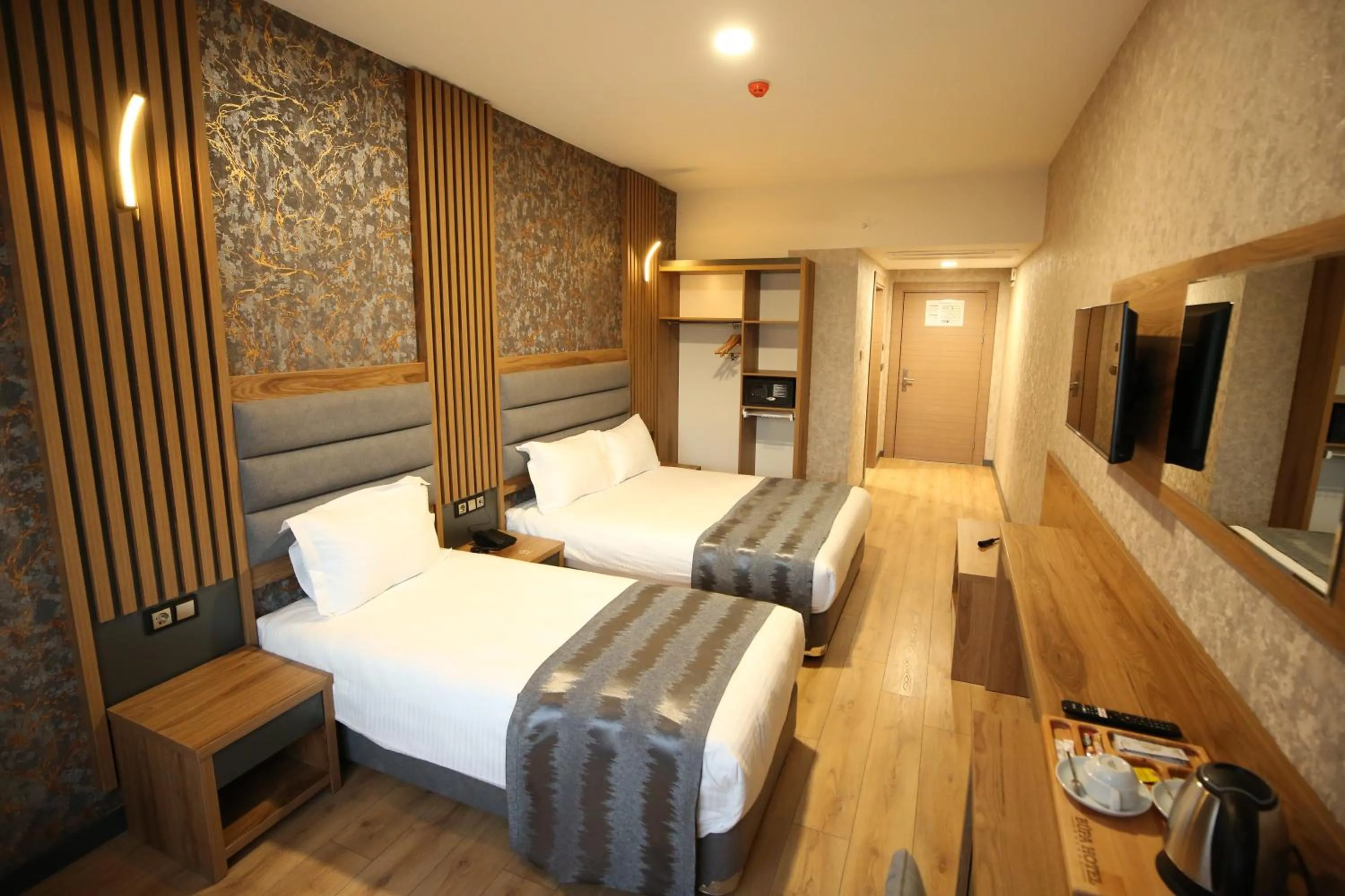 Bed in Büpa Plus Hotel