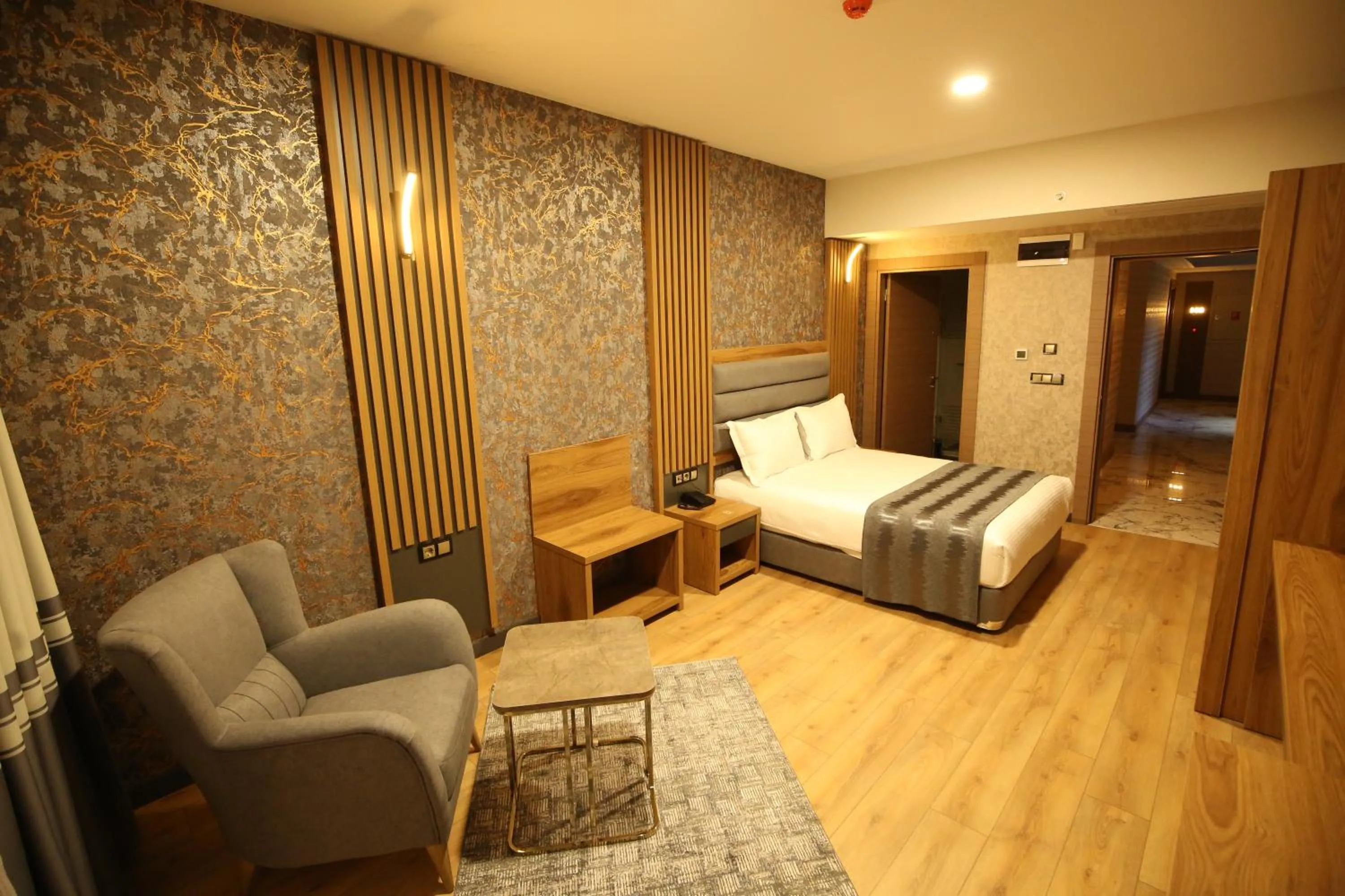 Bed in Büpa Plus Hotel