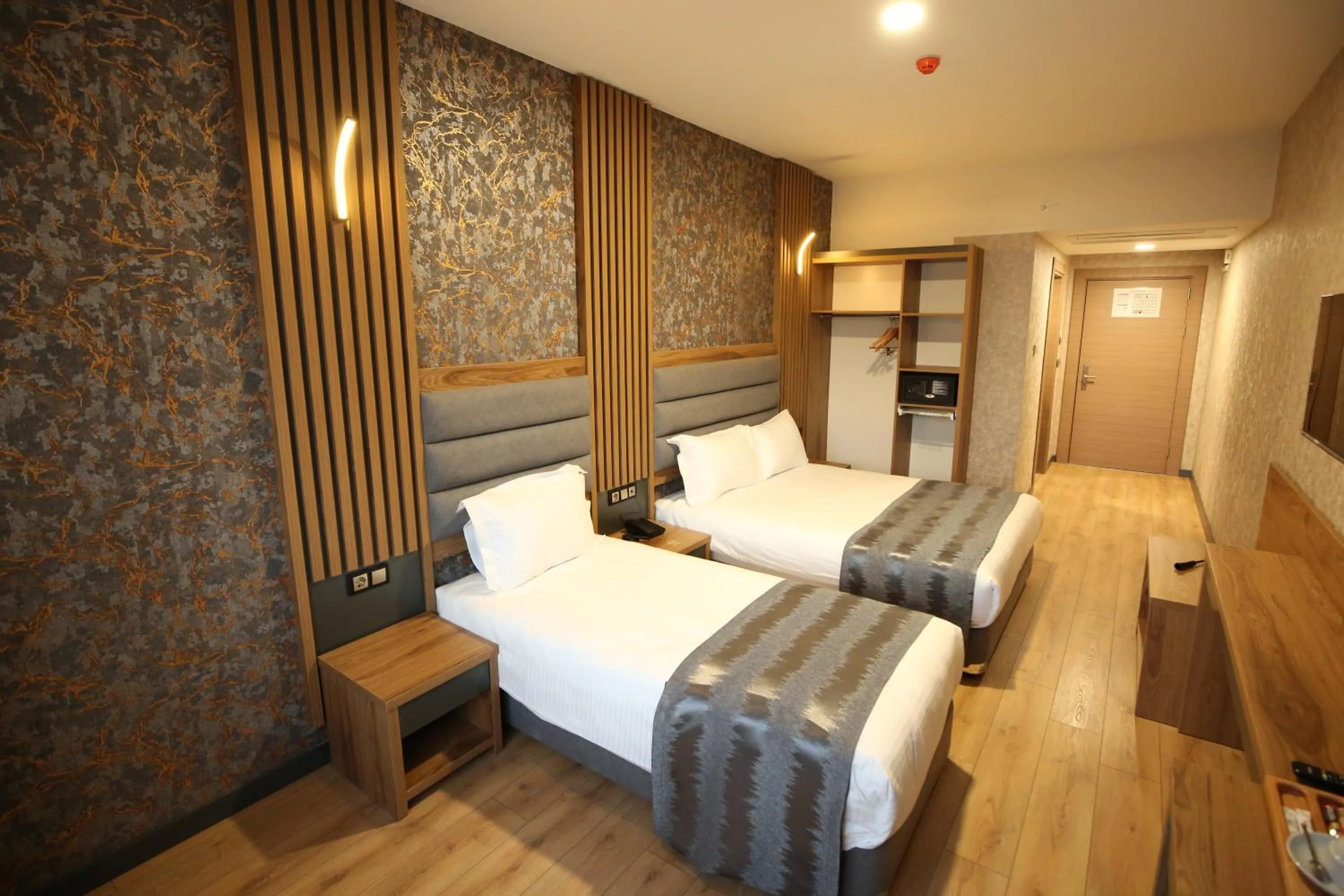 Bed in Büpa Plus Hotel