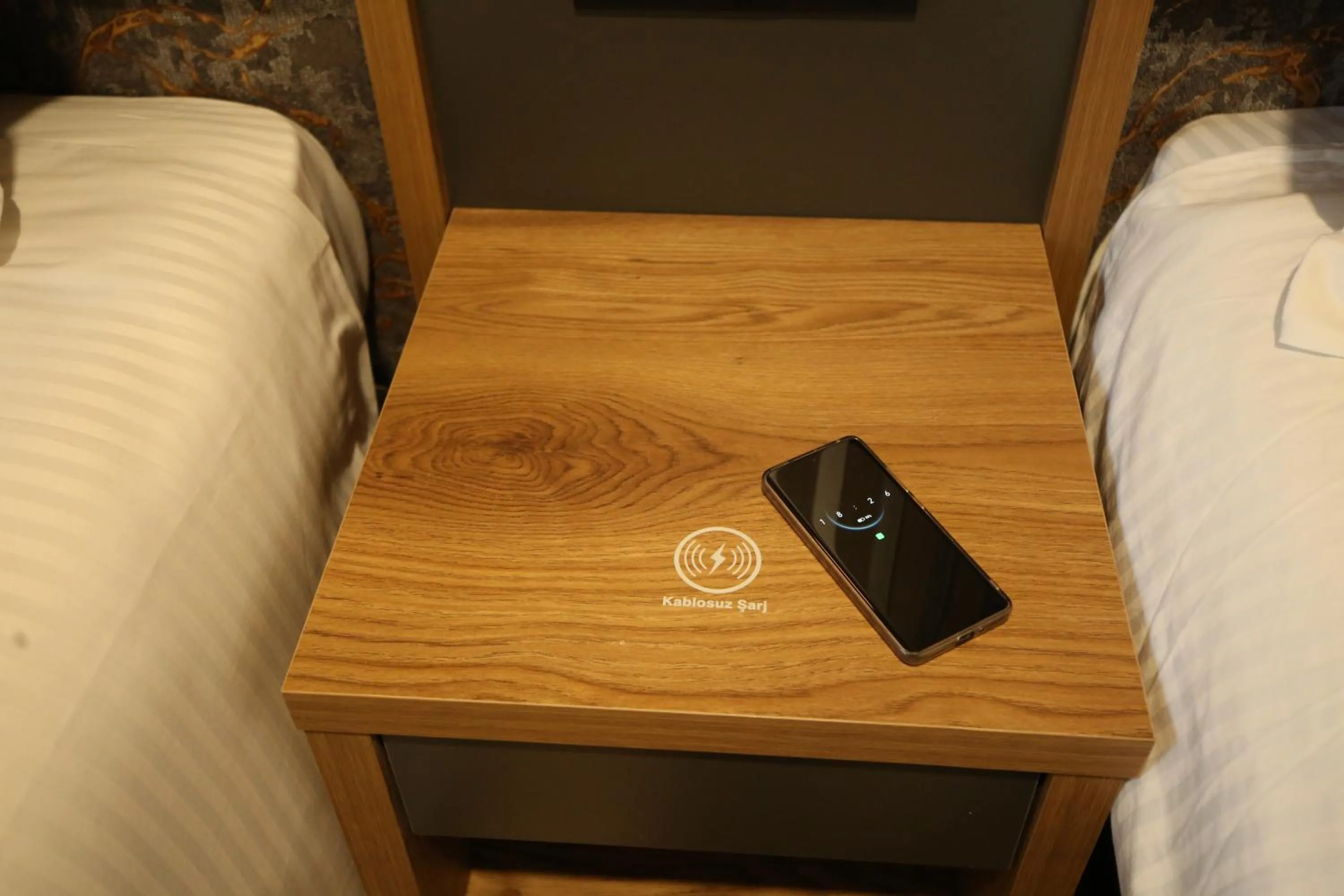 Bed in Büpa Plus Hotel