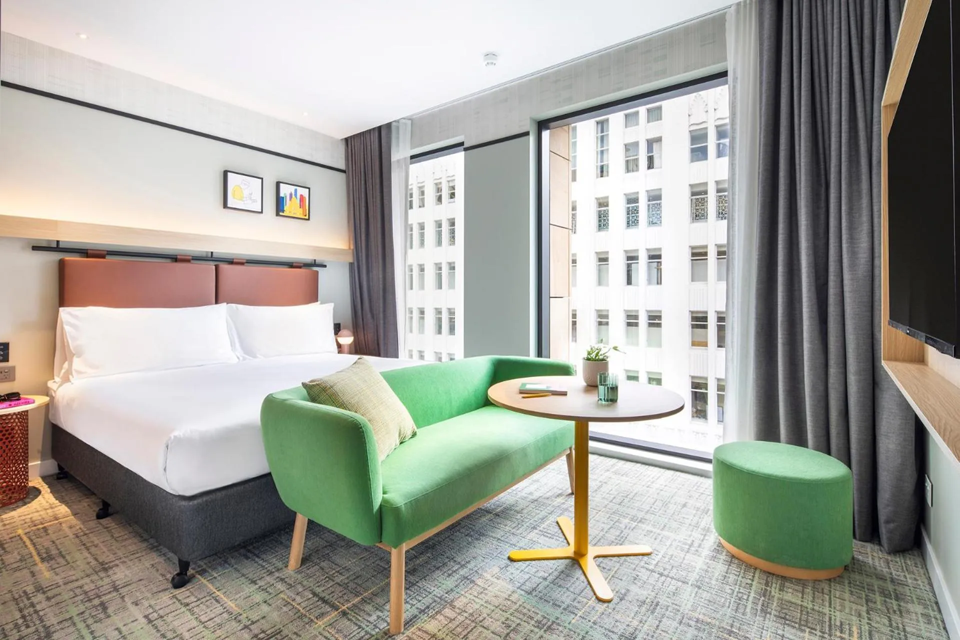 Seating area, Bed in Holiday Inn Melbourne Bourke Street Mall by IHG