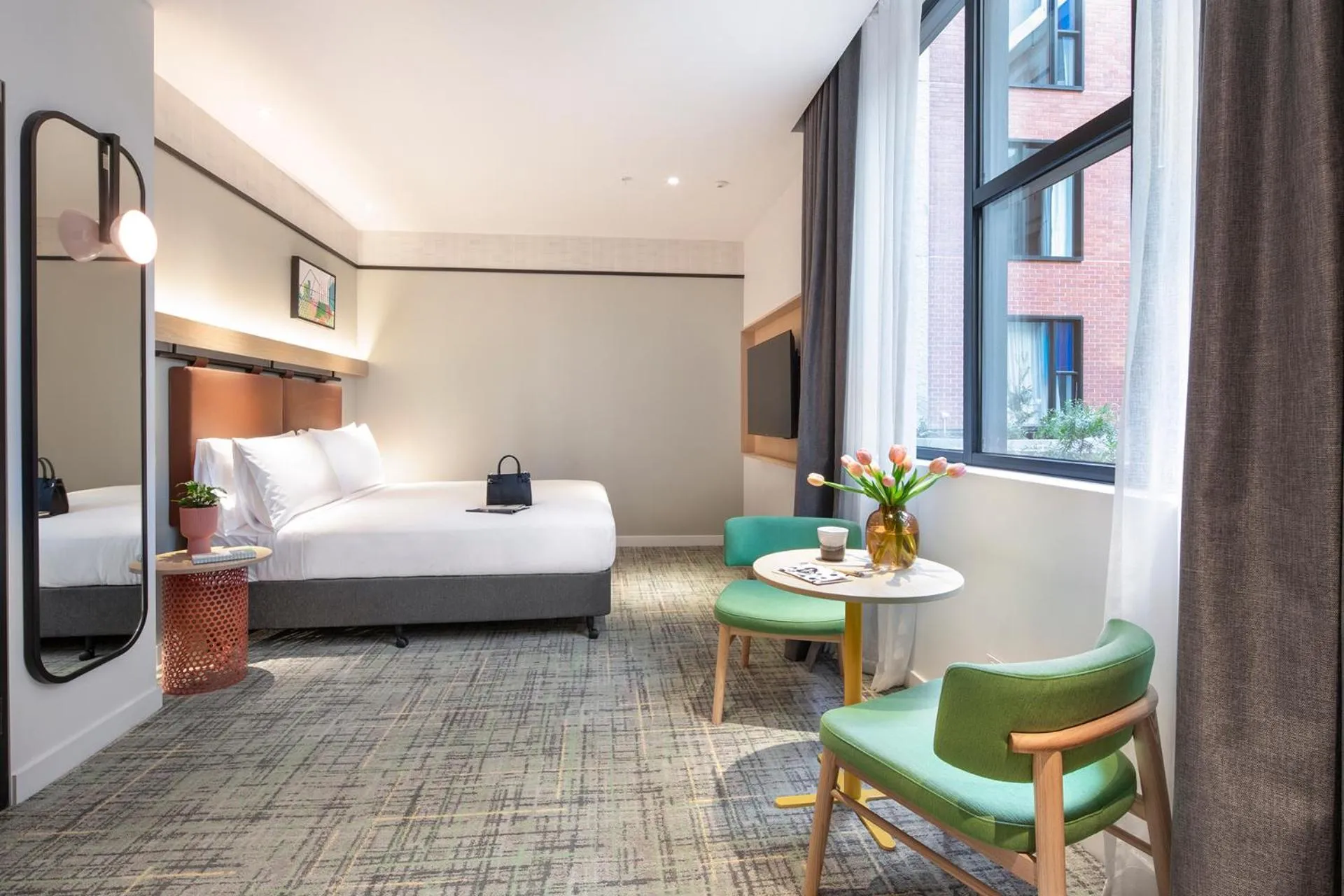 Seating area, Bed in Holiday Inn Melbourne Bourke Street Mall by IHG