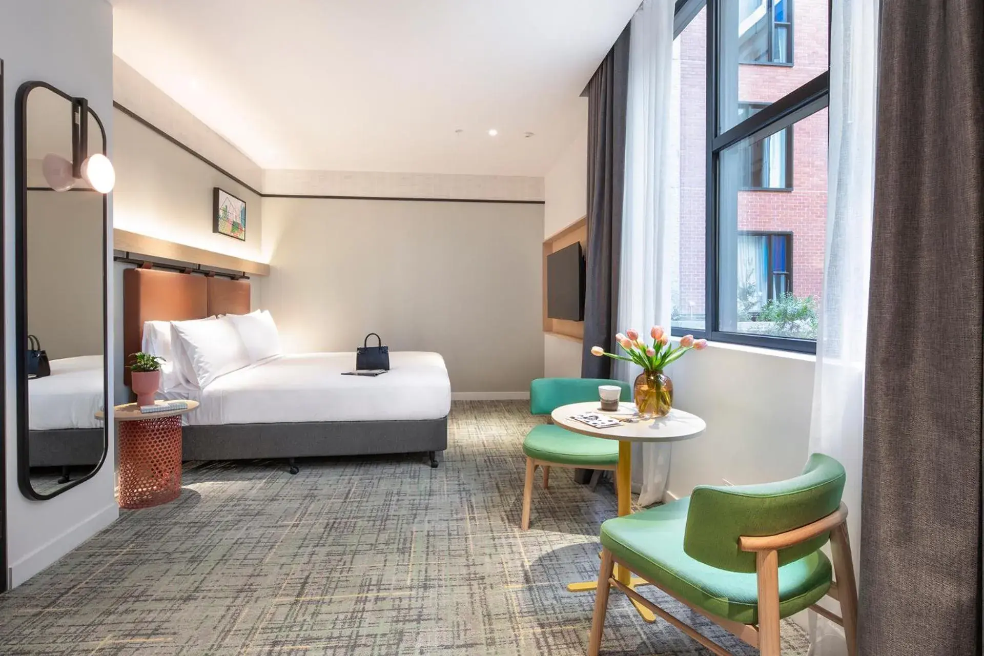 Seating area, Bed in Holiday Inn Melbourne Bourke Street Mall by IHG Seating area, Bed in Holiday Inn Melbourne Bourke Street Mall by IHG