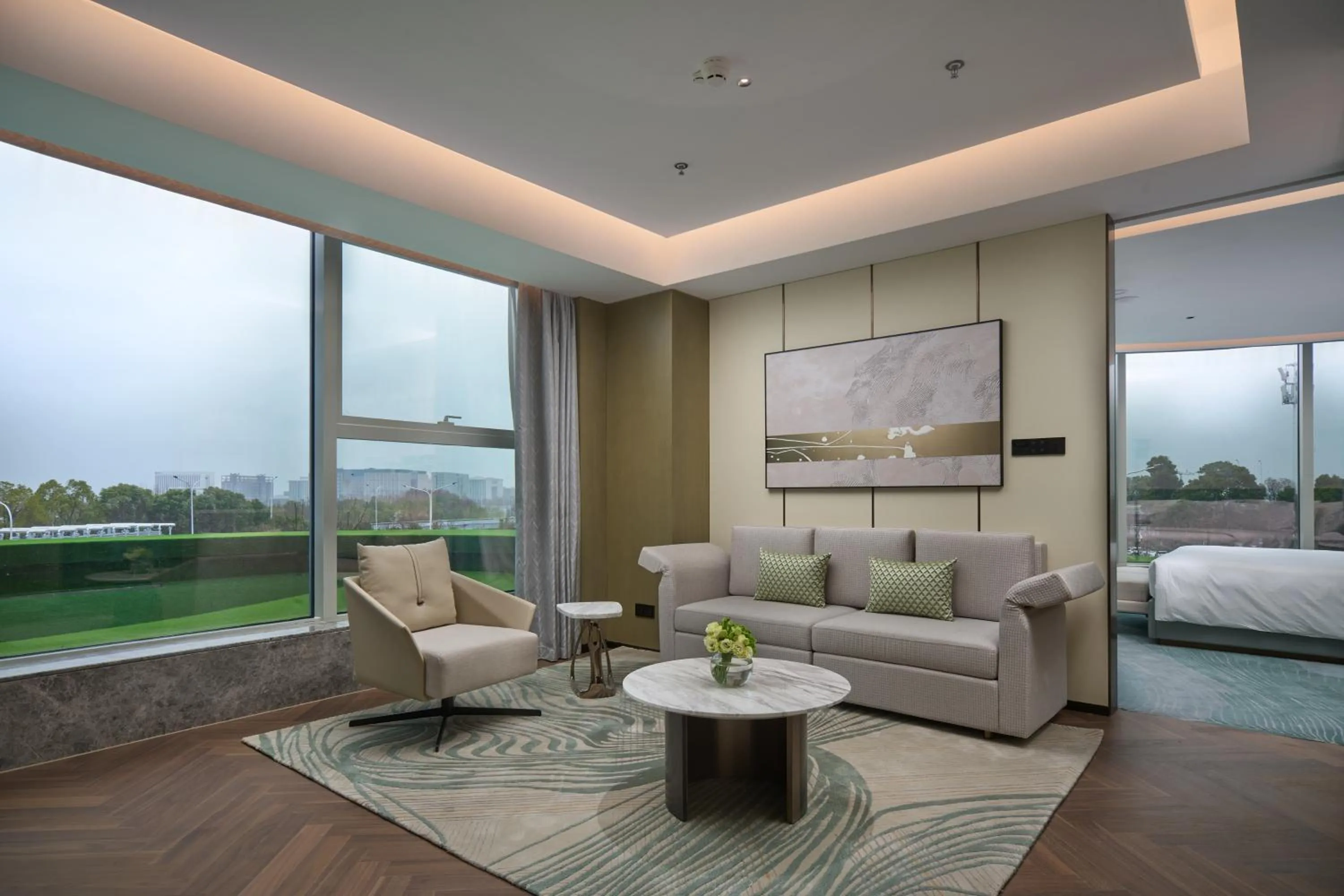 Living room in Holiday Inn Wuhan Tianhe Airport by IHG