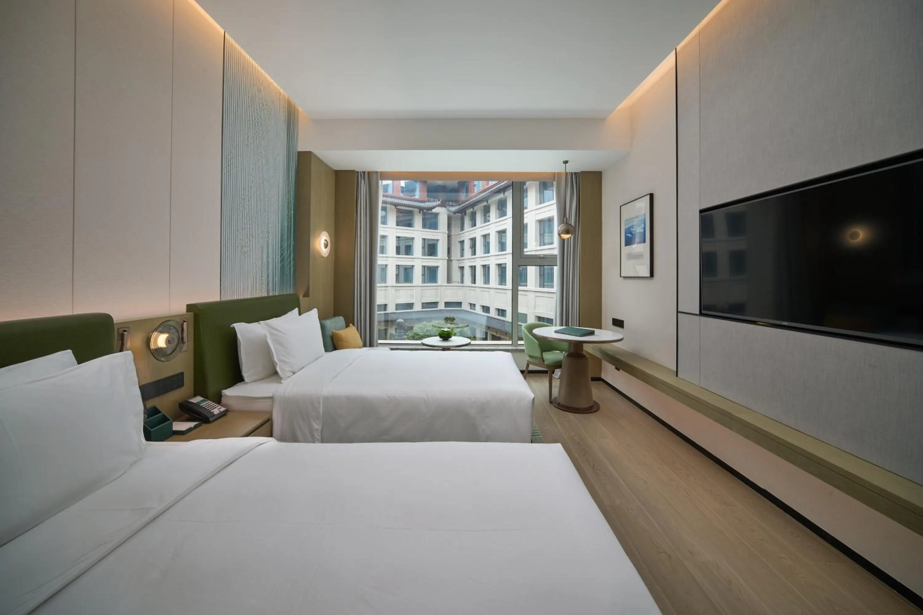 Photo of the whole room, Bed in Holiday Inn Wuhan Tianhe Airport by IHG