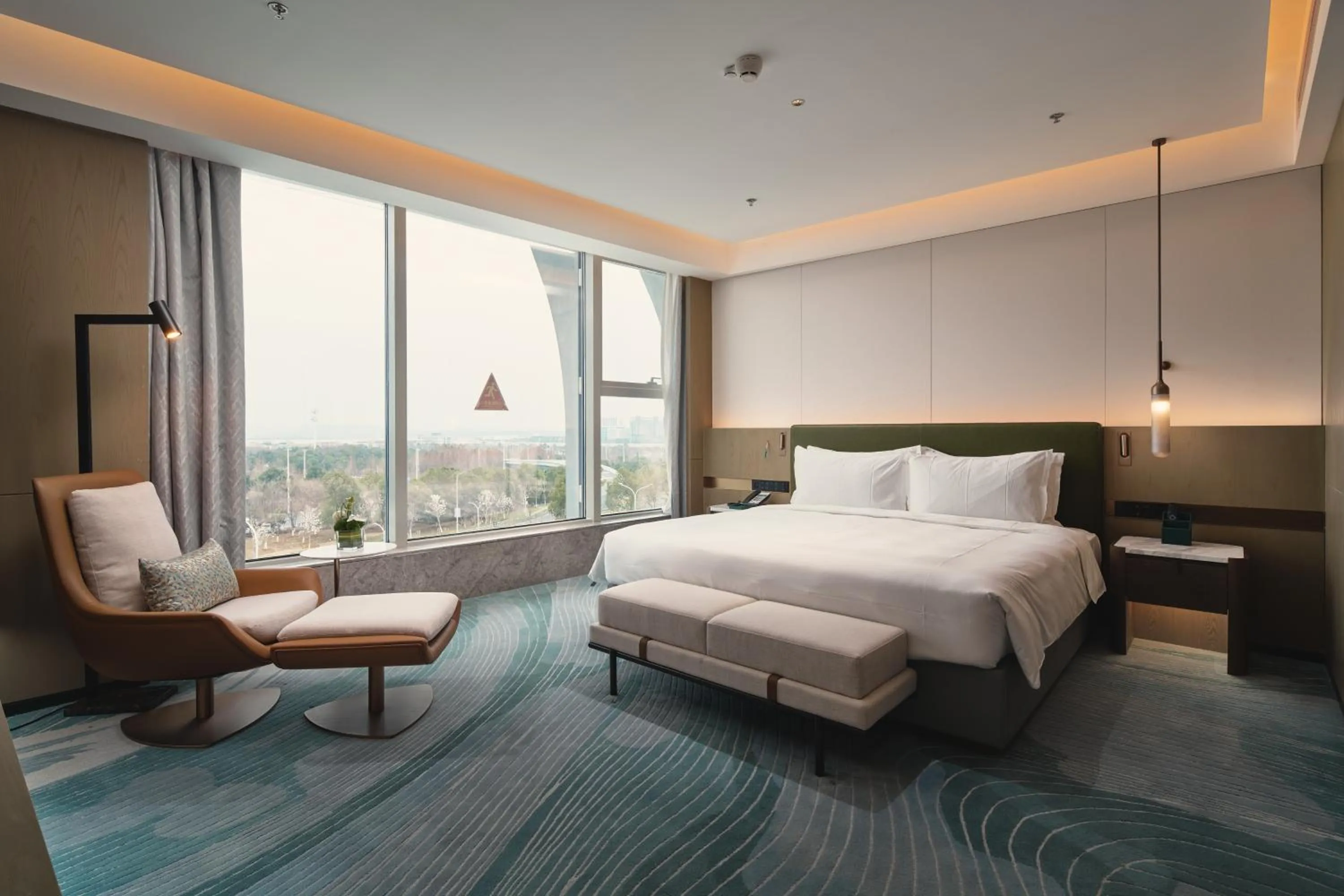Bed in Holiday Inn Wuhan Tianhe Airport by IHG