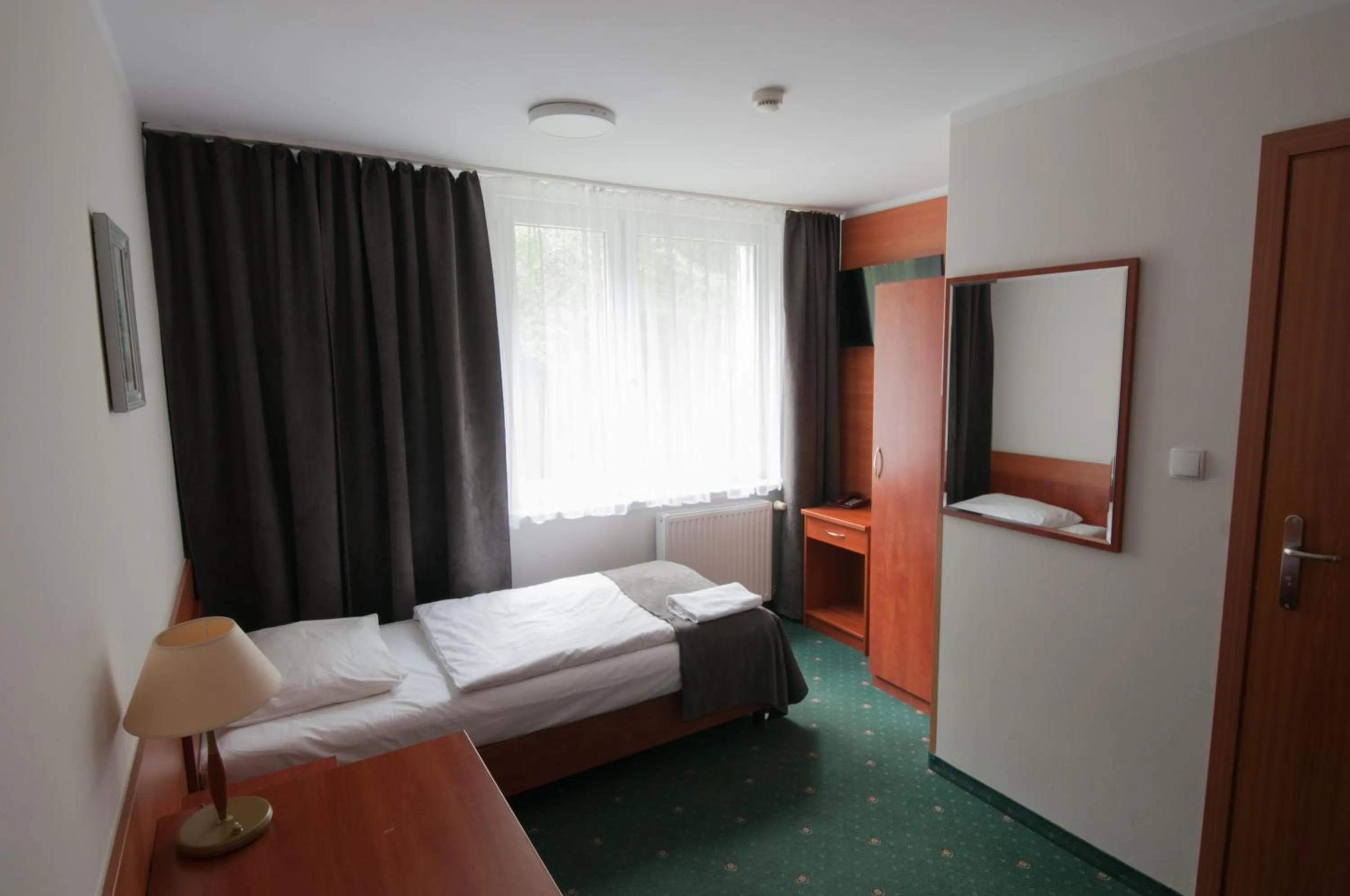 Bed in Hotel Biały