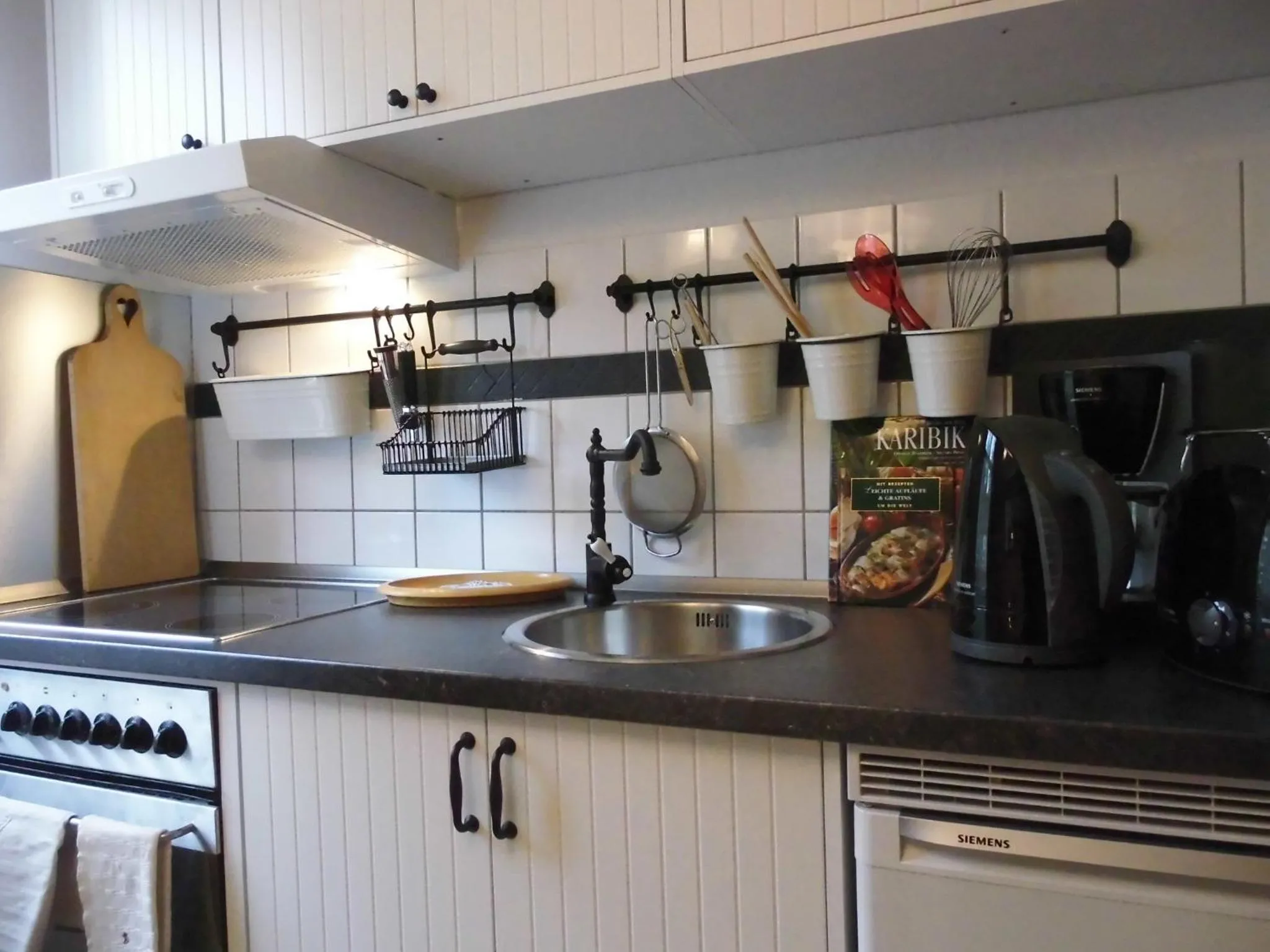Kitchen or kitchenette in SchlossparkFerienwohnungen Rheinsberg mit Garten