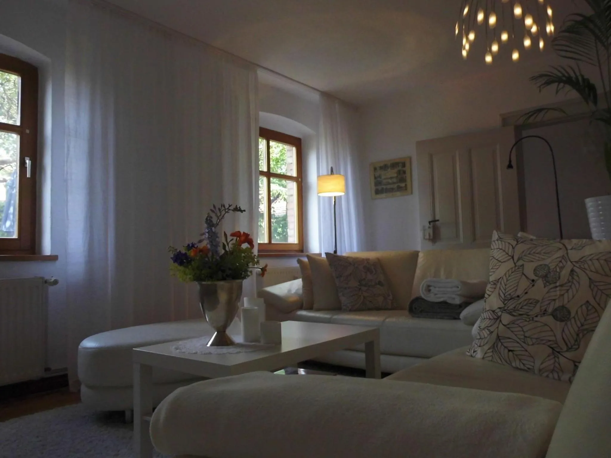 Living room in SchlossparkFerienwohnungen Rheinsberg mit Garten