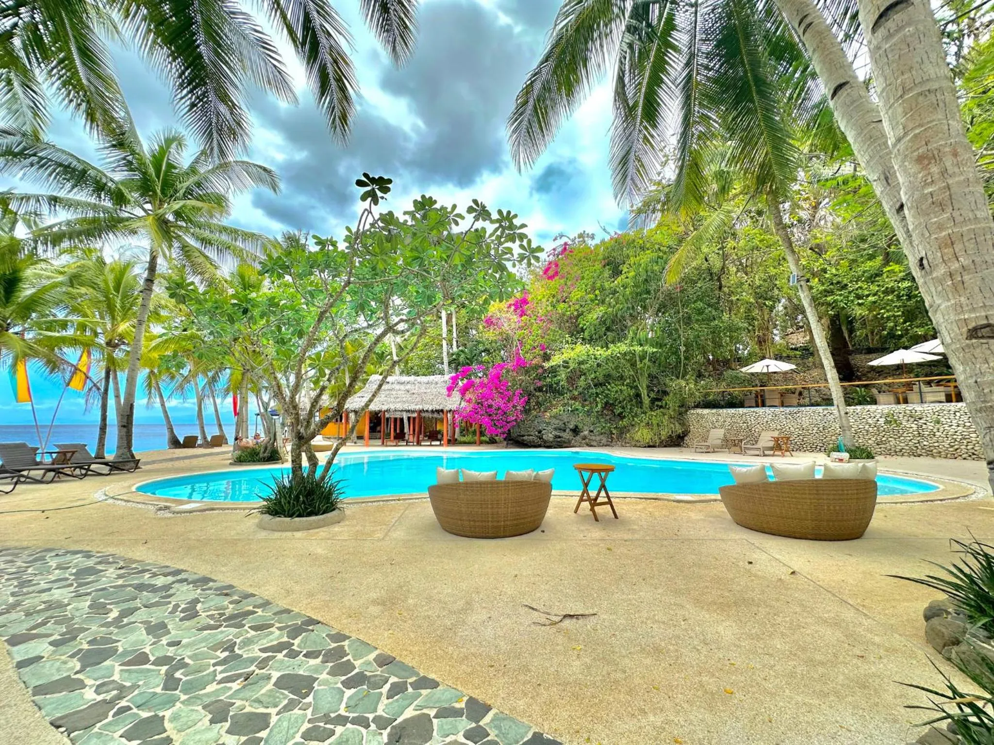 Swimming pool in Coco Sunset Beach Resort