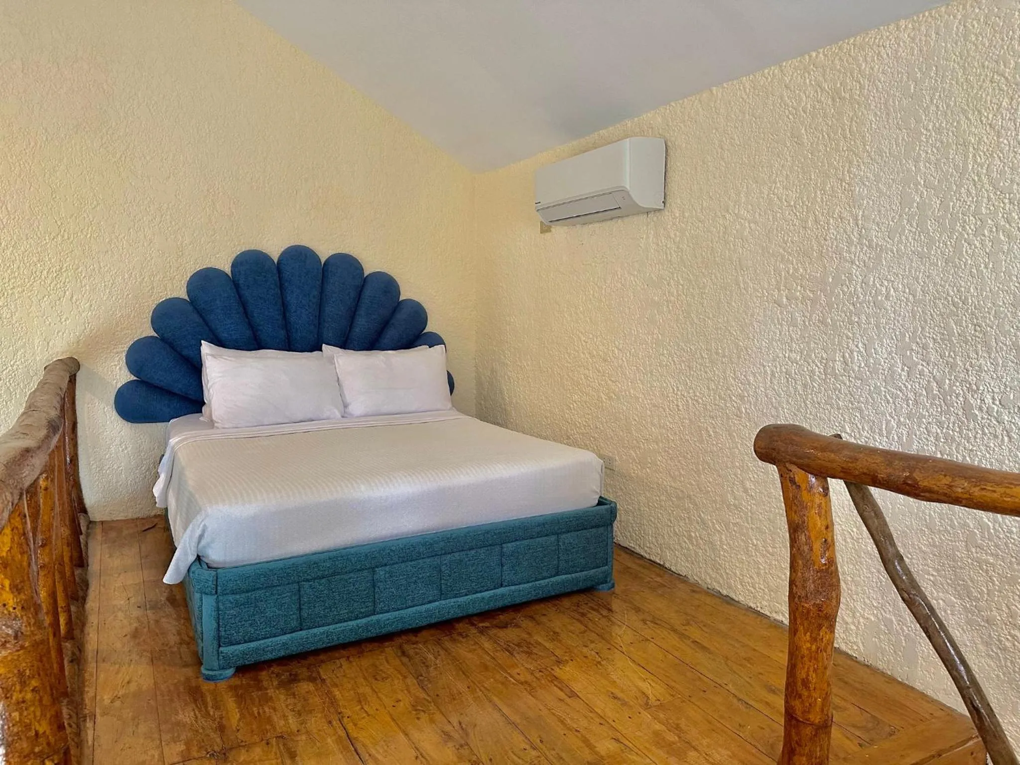 Bed in Coco Sunset Beach Resort