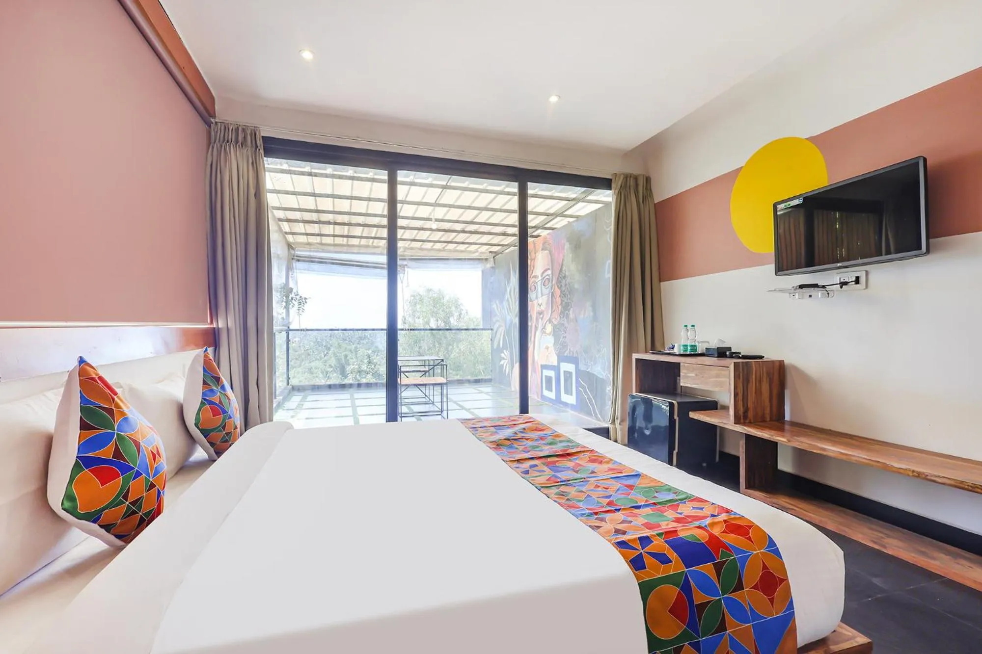 Bed in FabHotel Hillora Coastal Resort