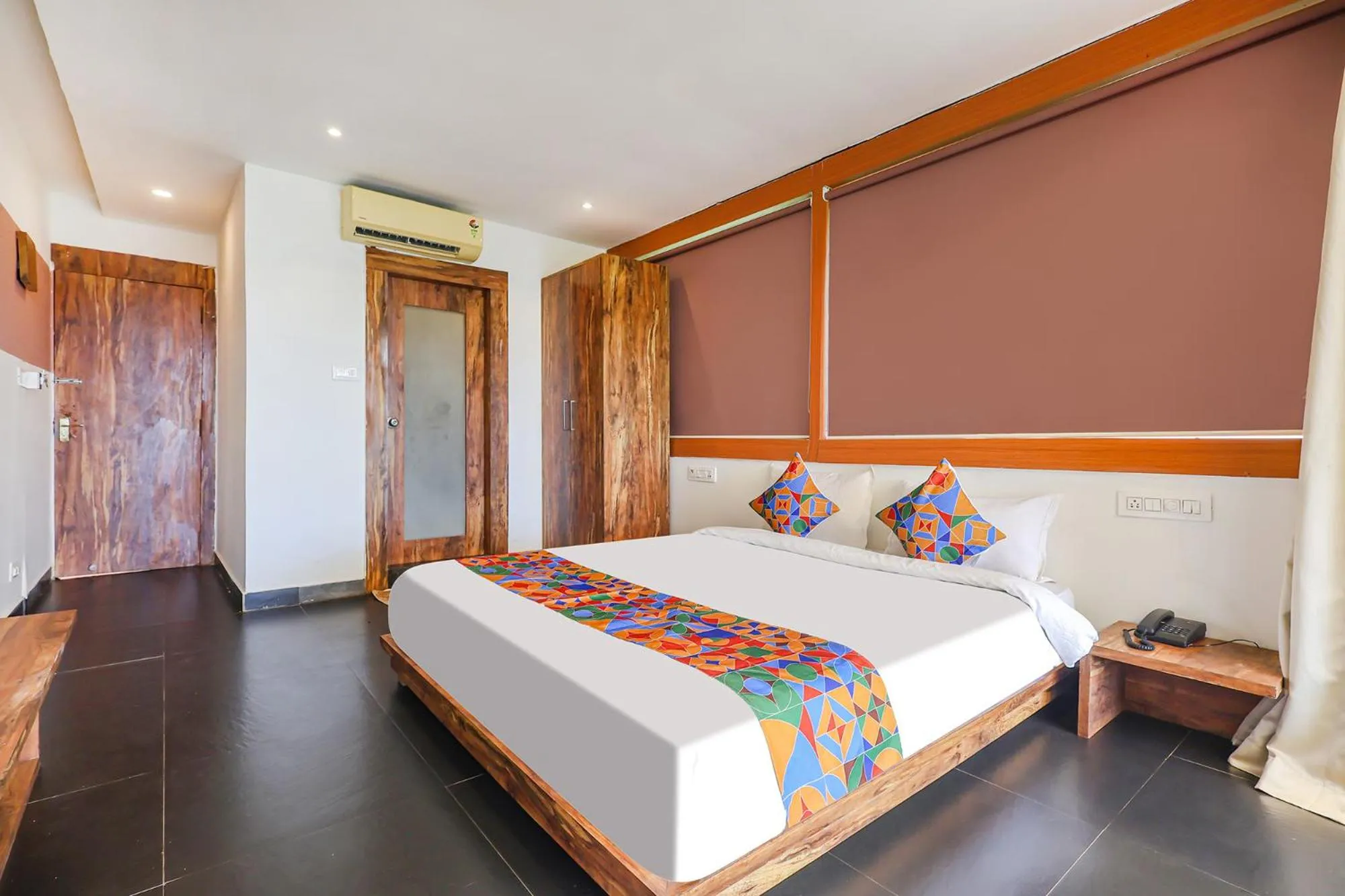 Bed in FabHotel Hillora Coastal Resort