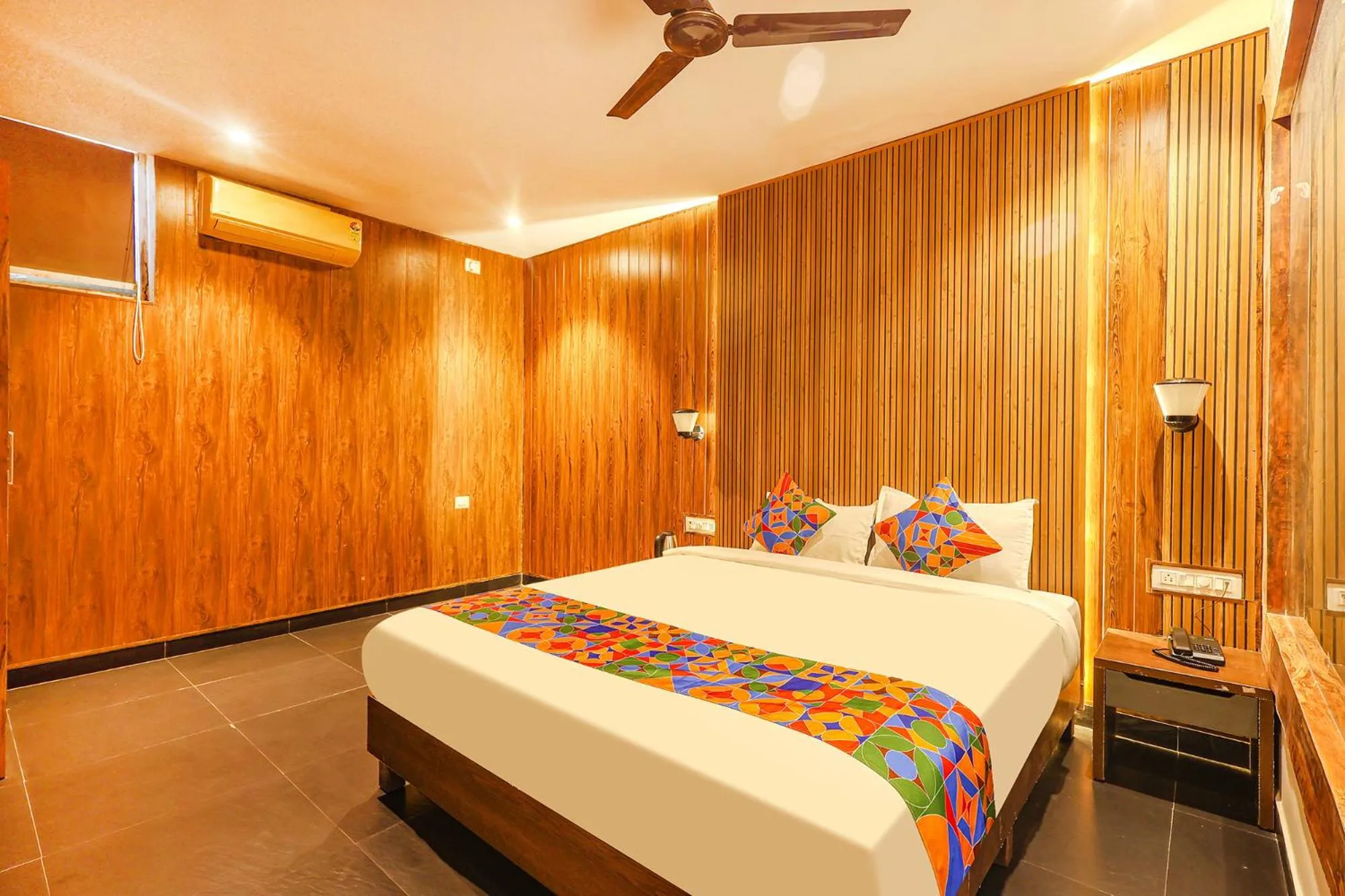 Bed in FabHotel Hillora Coastal Resort