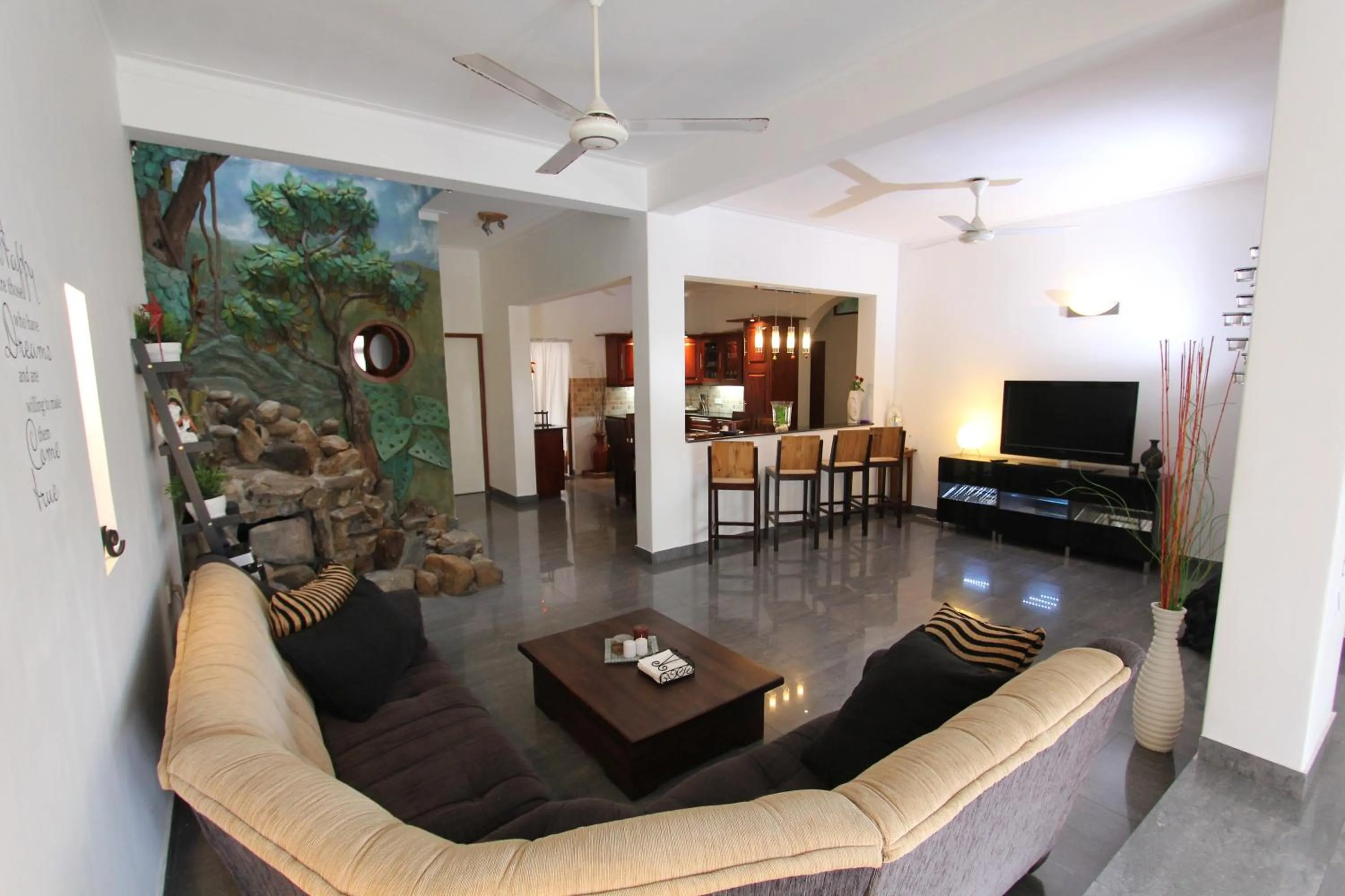 Communal lounge/ TV room in Angel villa