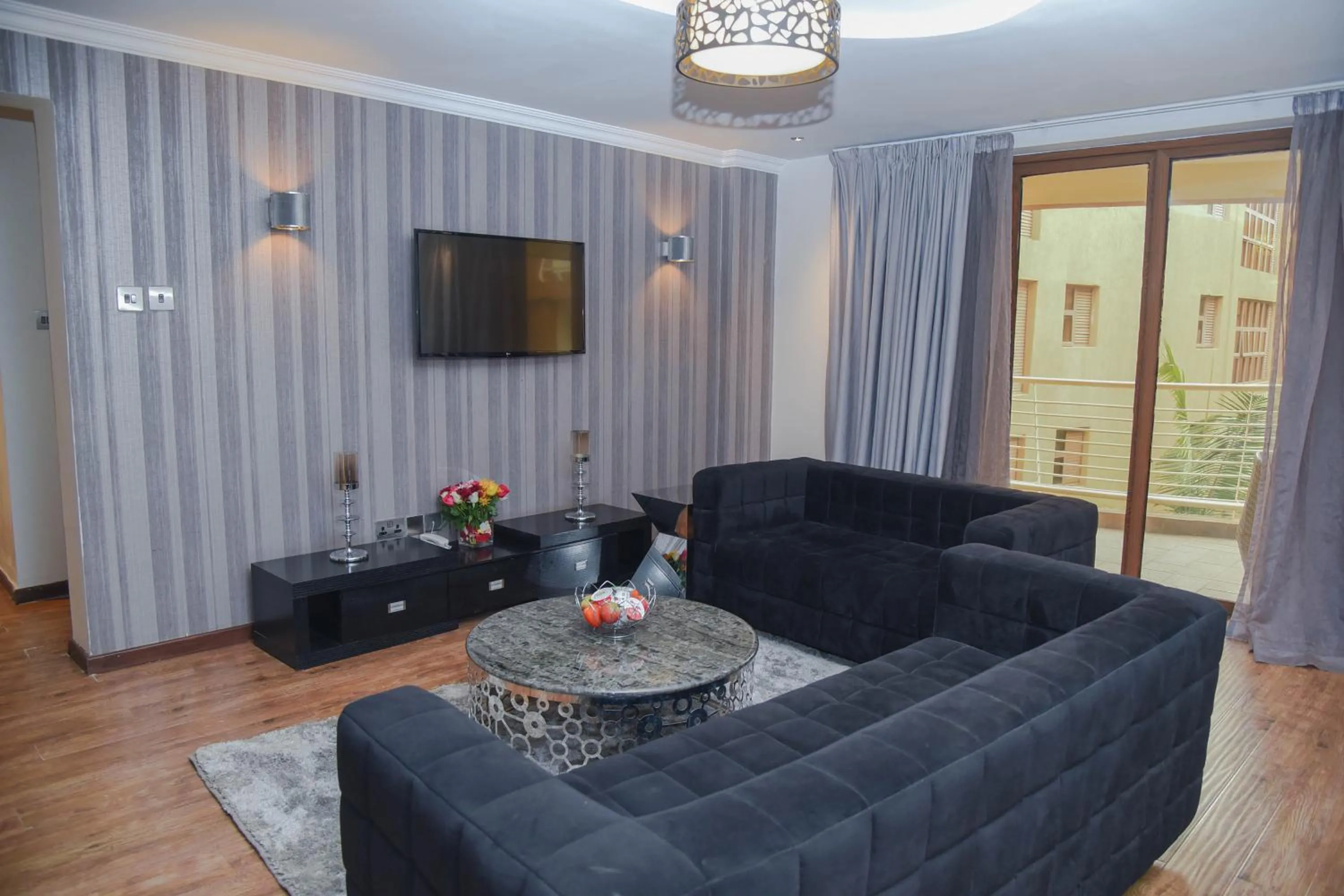 Living room in Lavington Residences By Trianum