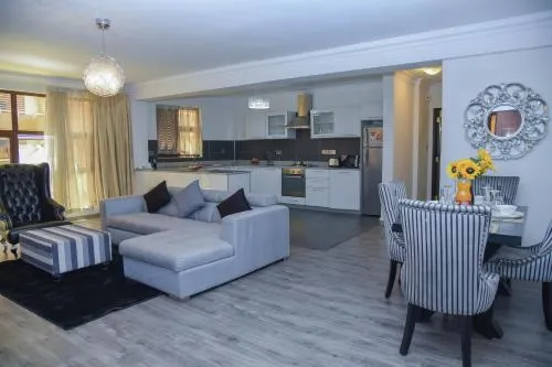 TV and multimedia in Lavington Residences By Trianum