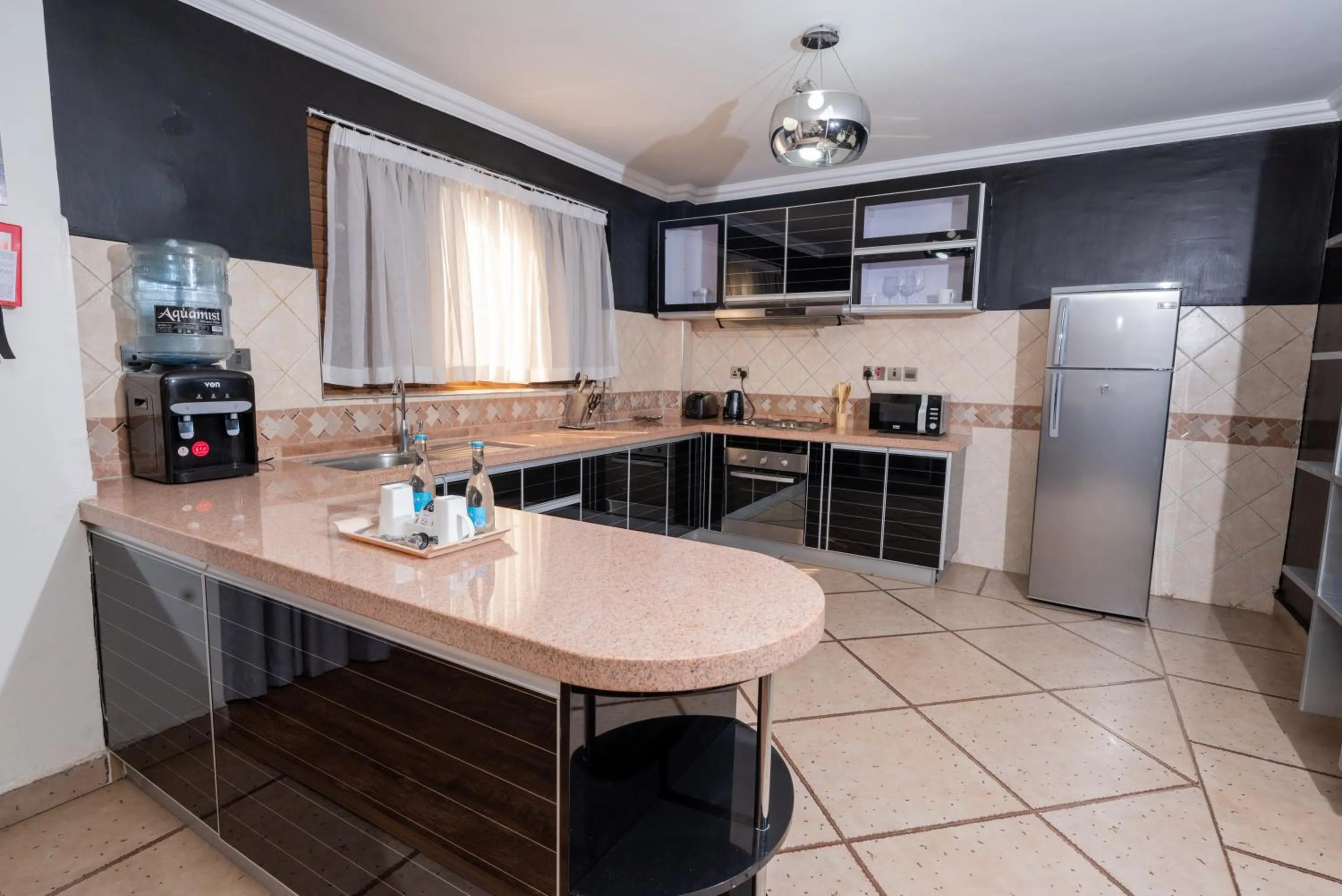 kitchen in Lavington Residences By Trianum