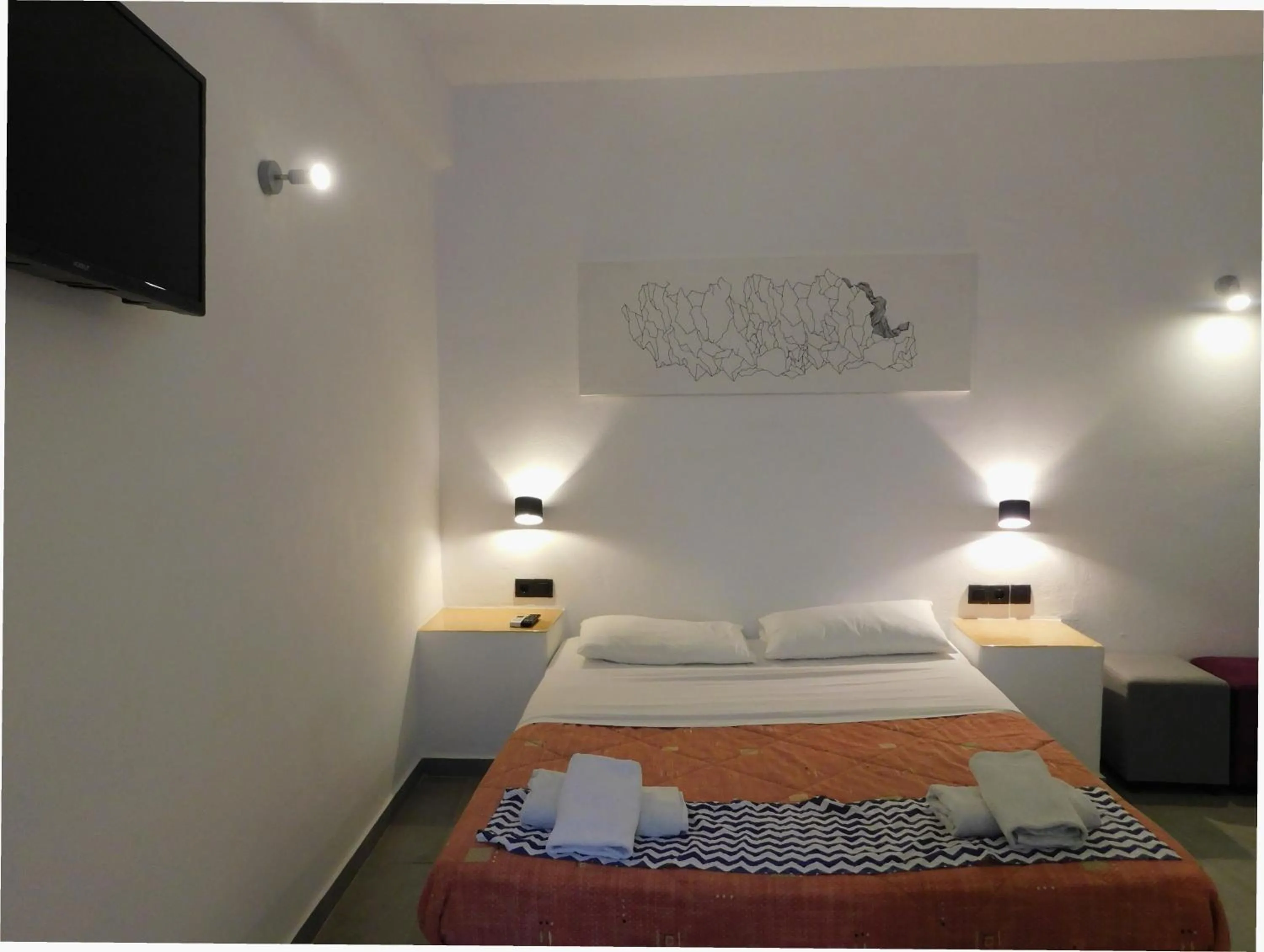 Bed in Aegean Studios Perissa