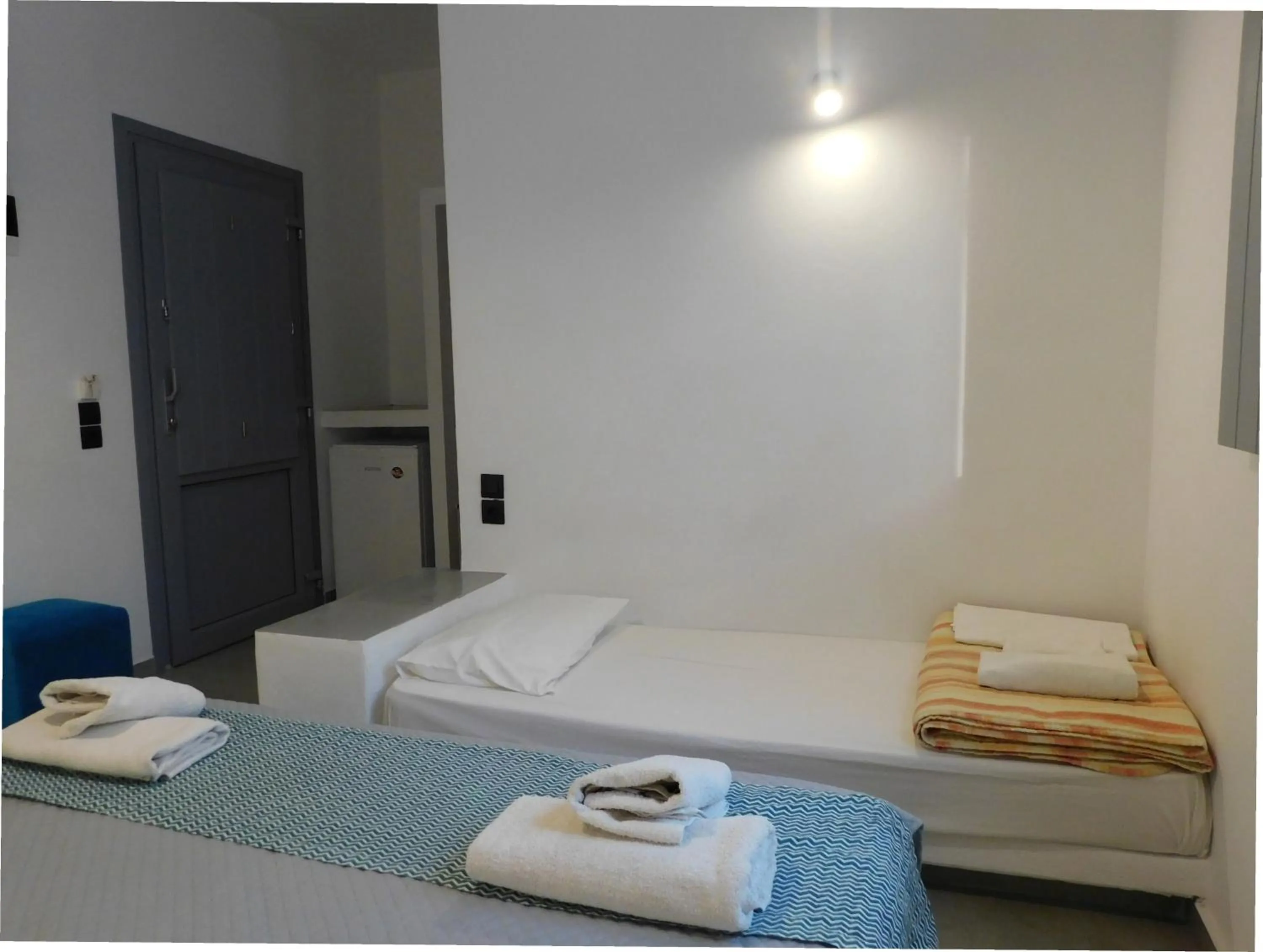 Bedroom, Bed in Aegean Studios Perissa