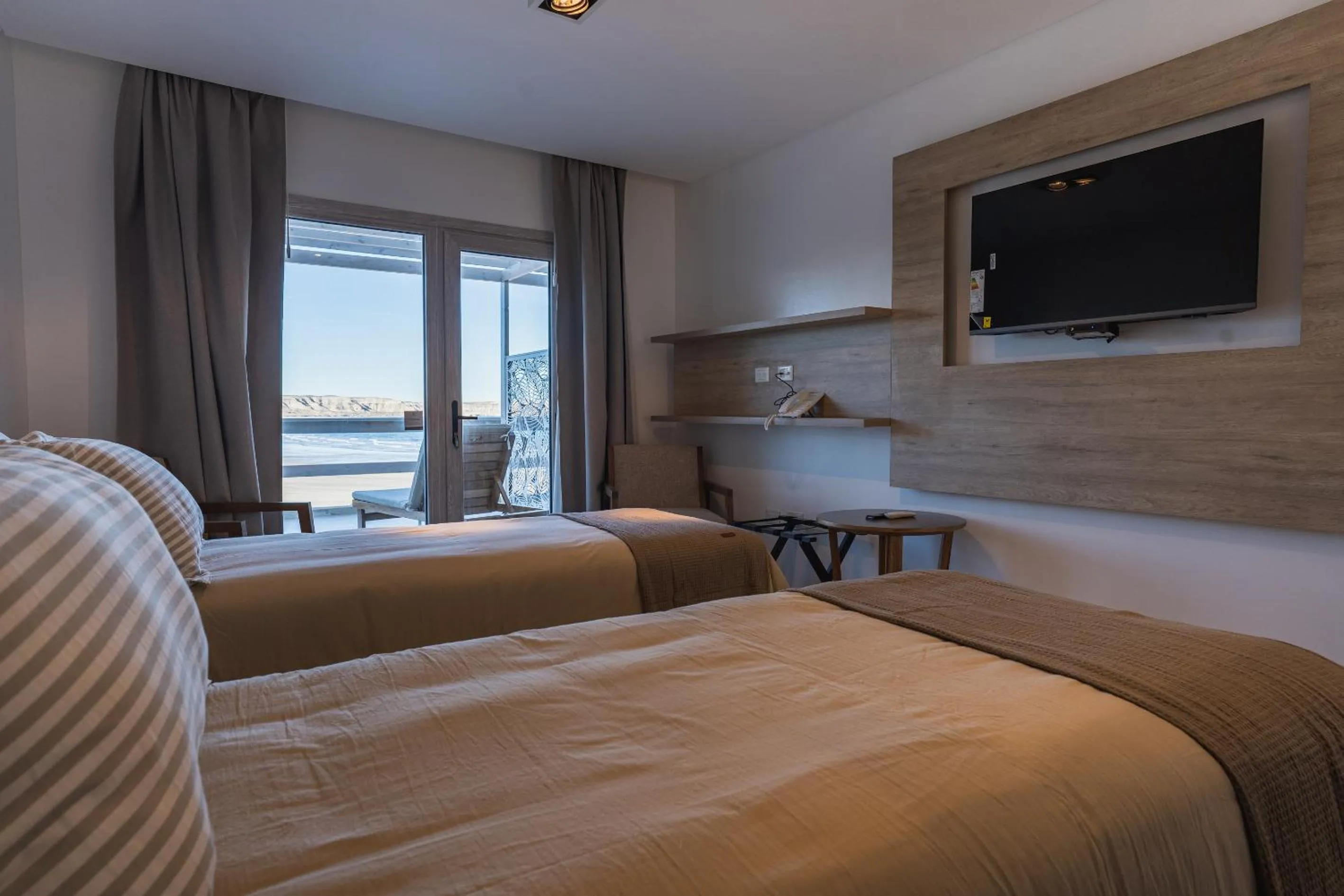 Communal lounge/ TV room, Bed in Rayentray Puerto Piramides