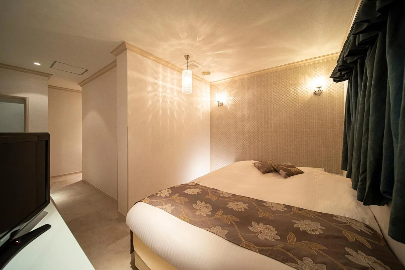 Bed in ホテル リベラル 男塾ホテルグループ