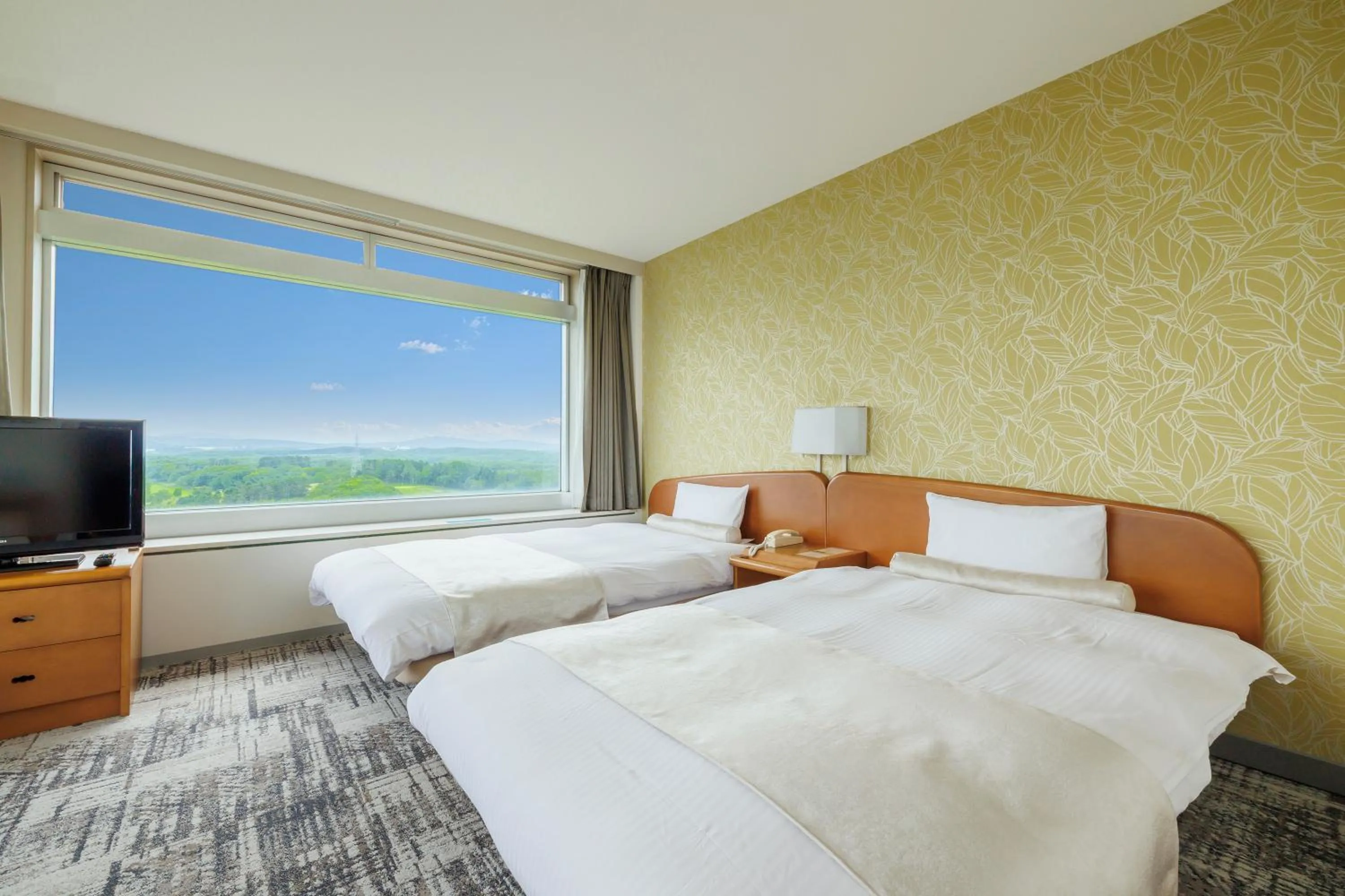 Bed in Kitahiroshima Classe Hotel