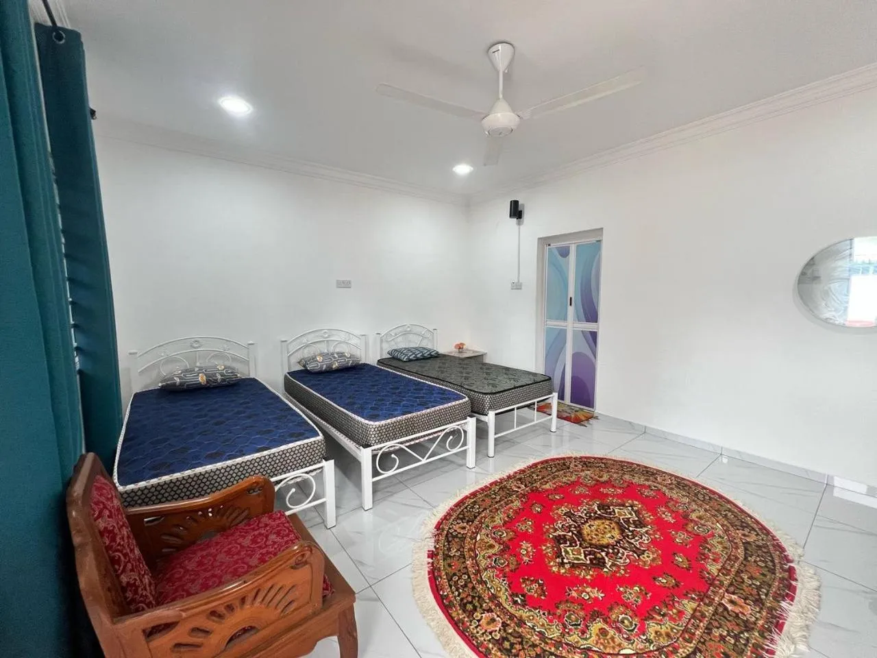 Bedroom in Capital O 91117 Noor Room Stay