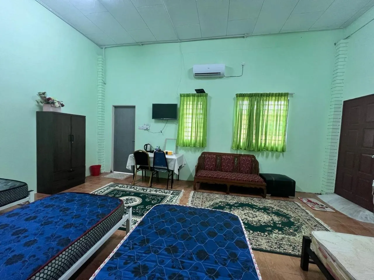 Bedroom in Capital O 91117 Noor Room Stay