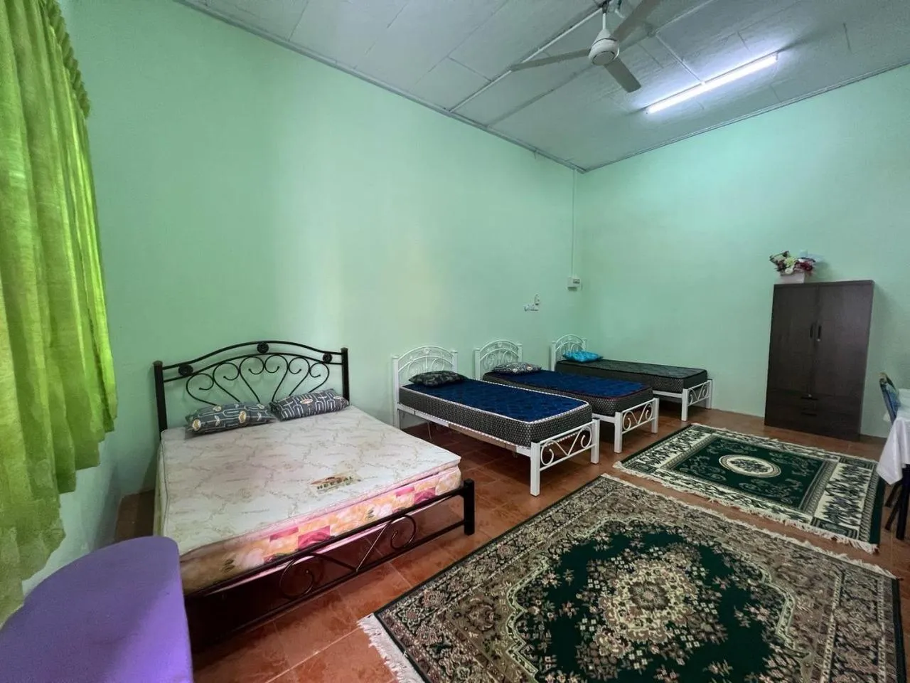 Bedroom in Capital O 91117 Noor Room Stay