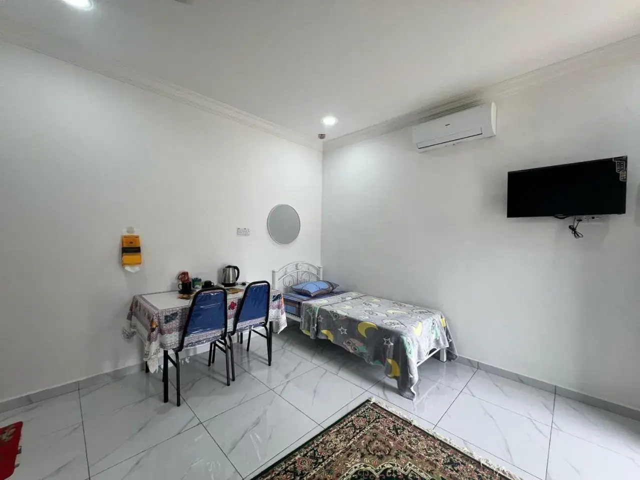 Bedroom in Capital O 91117 Noor Room Stay Bedroom in Capital O 91117 Noor Room Stay