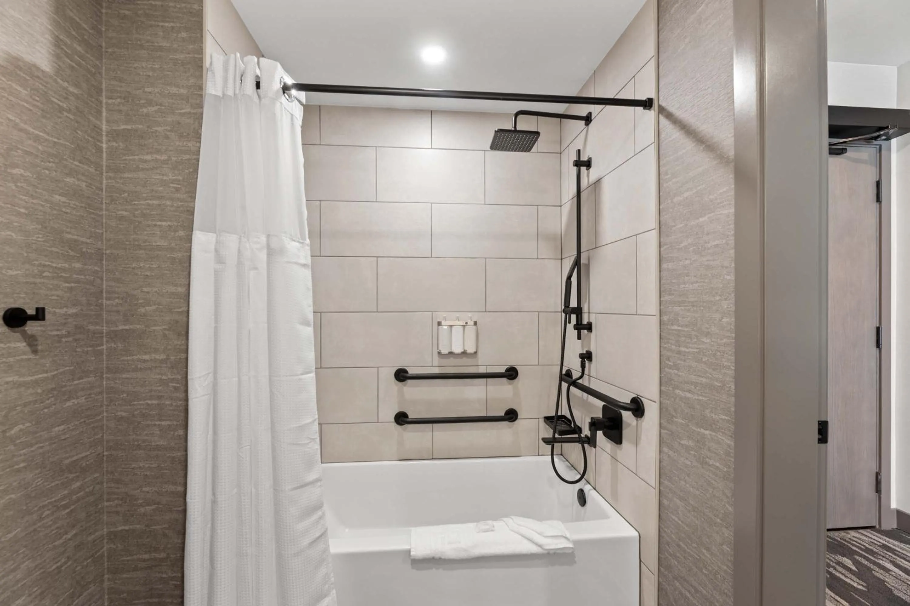 Bathroom in Sandman Signature Dallas Las Colinas Hotel & Suites