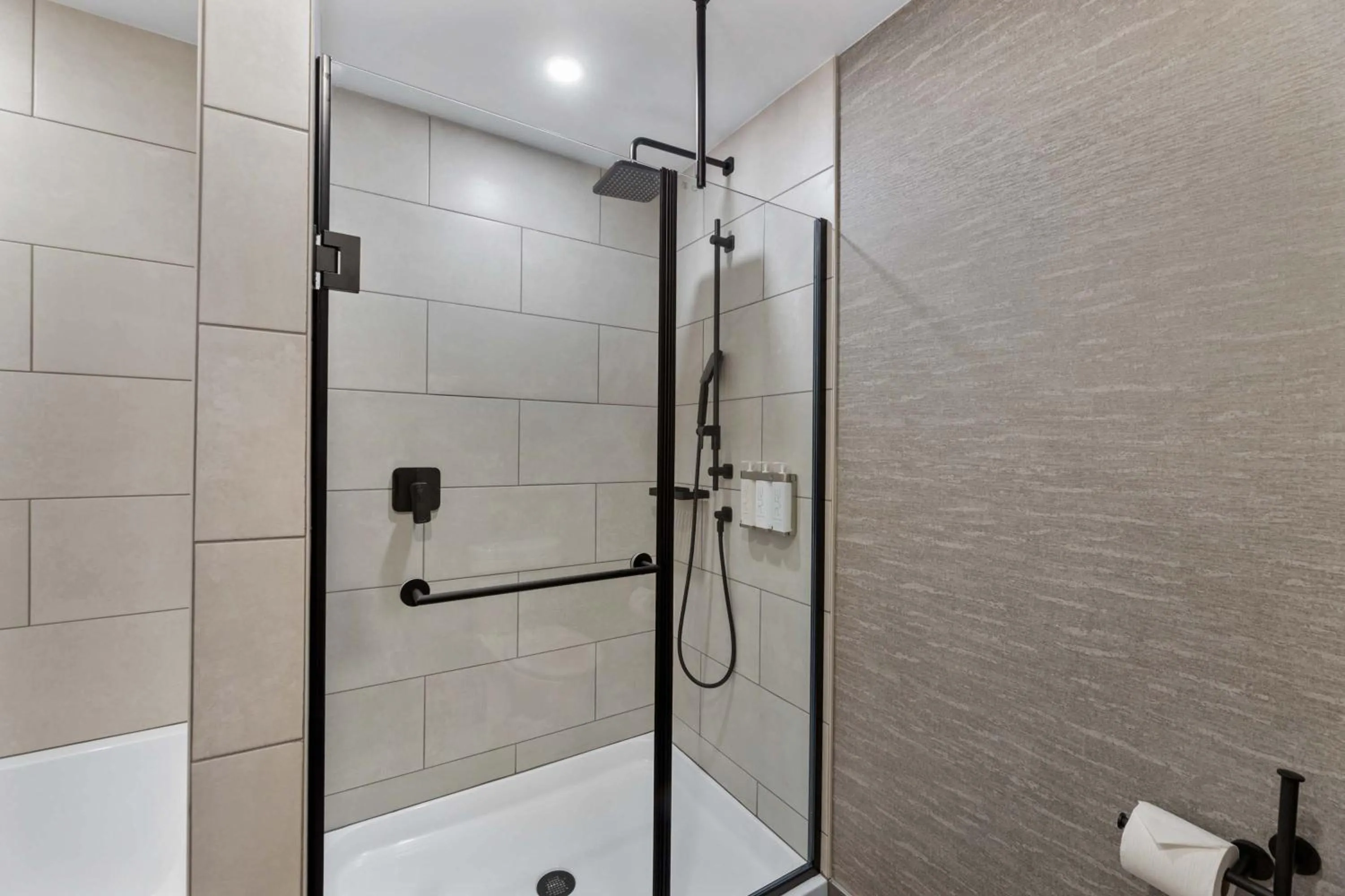 Bathroom in Sandman Signature Dallas Las Colinas Hotel & Suites