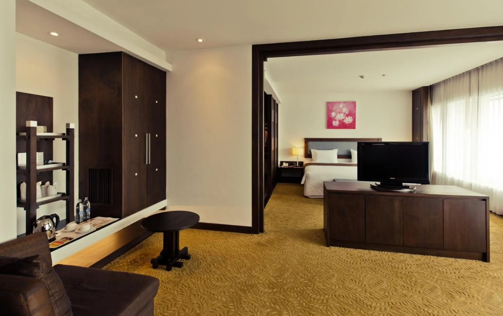 Bed in Sunee Grand Hotel and Convention Center