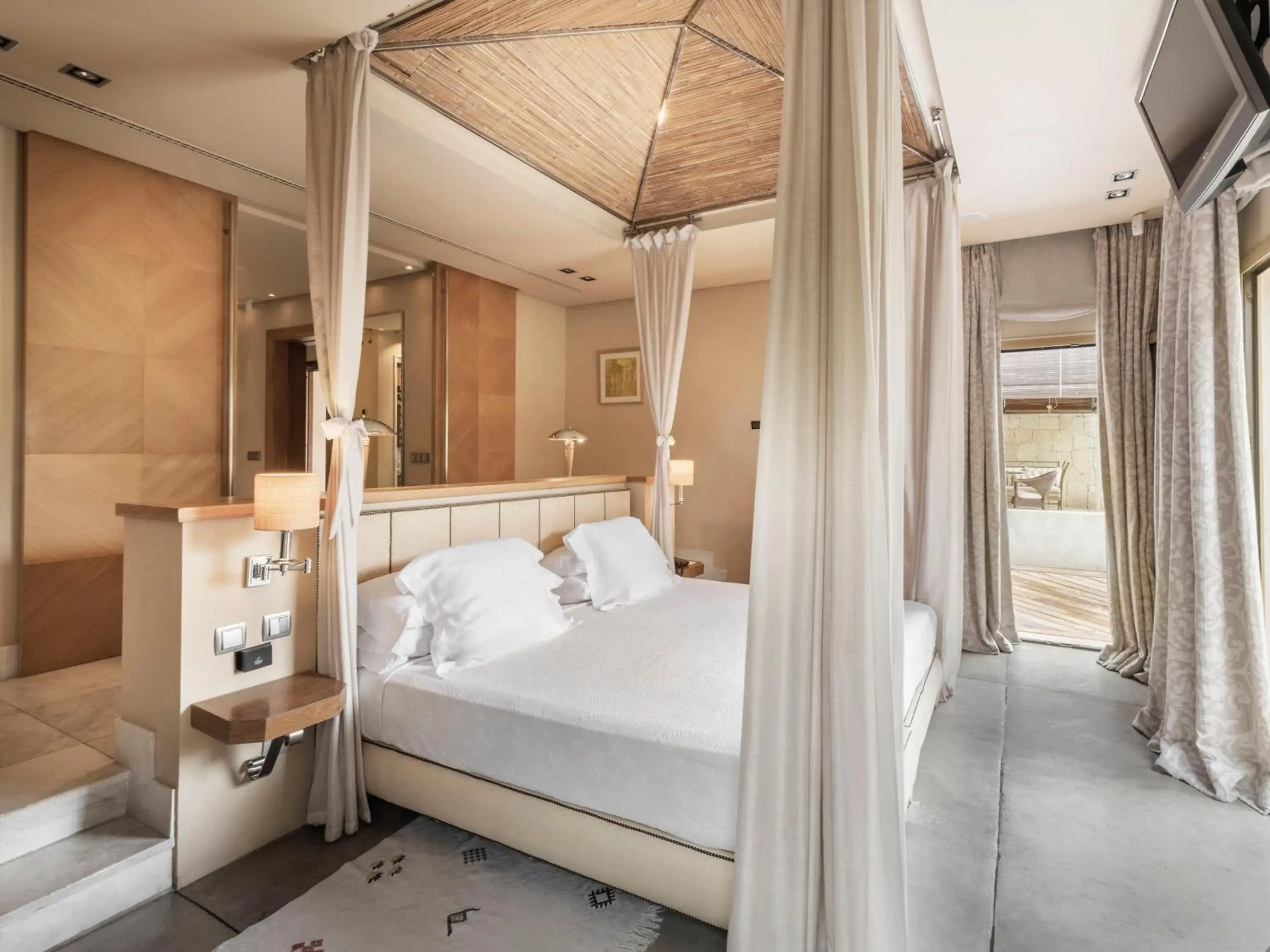 Bed in The Villas at Bahia del Duque Bed in The Villas at Bahia del Duque