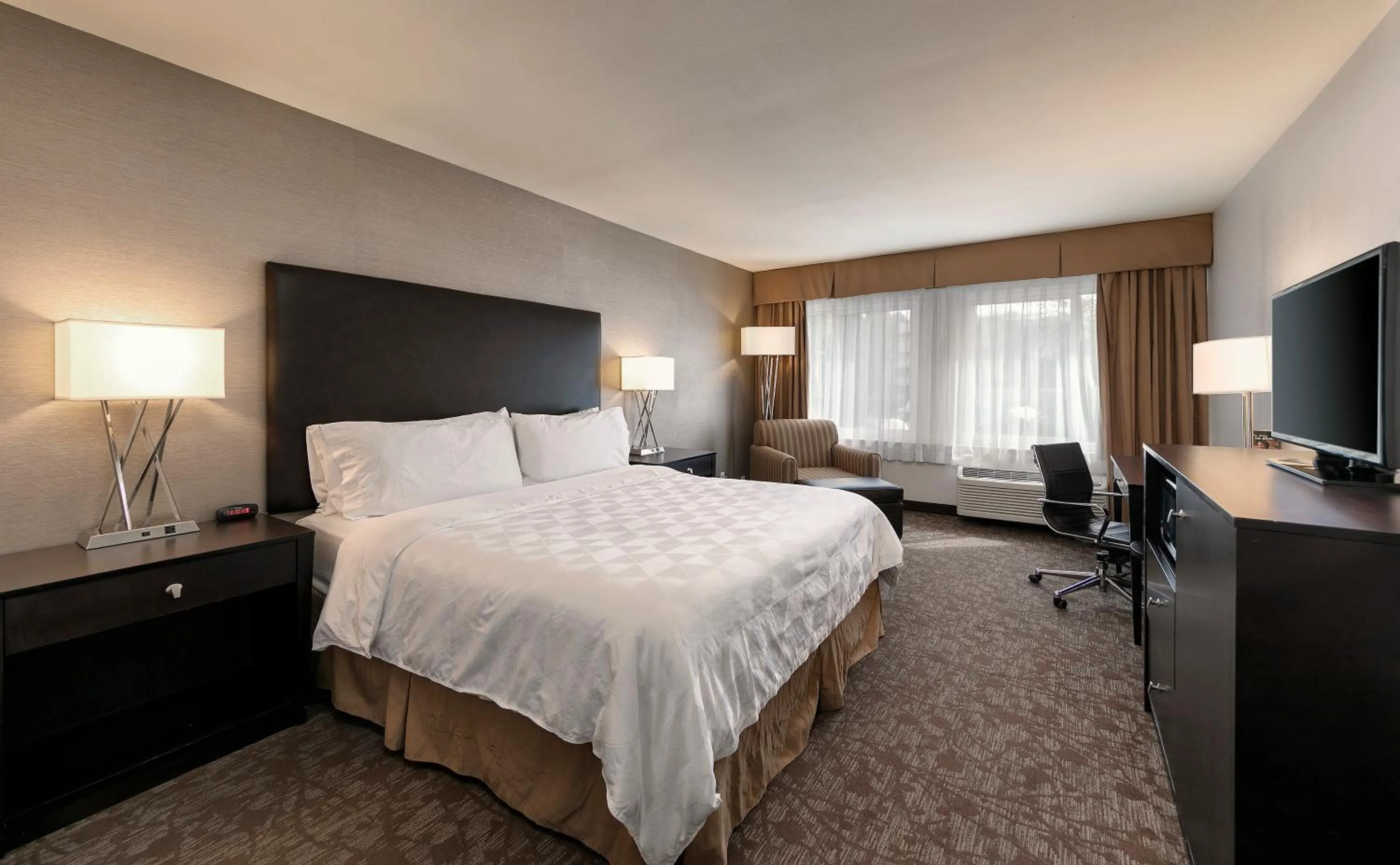 Bed in Pacific Stay Hotel