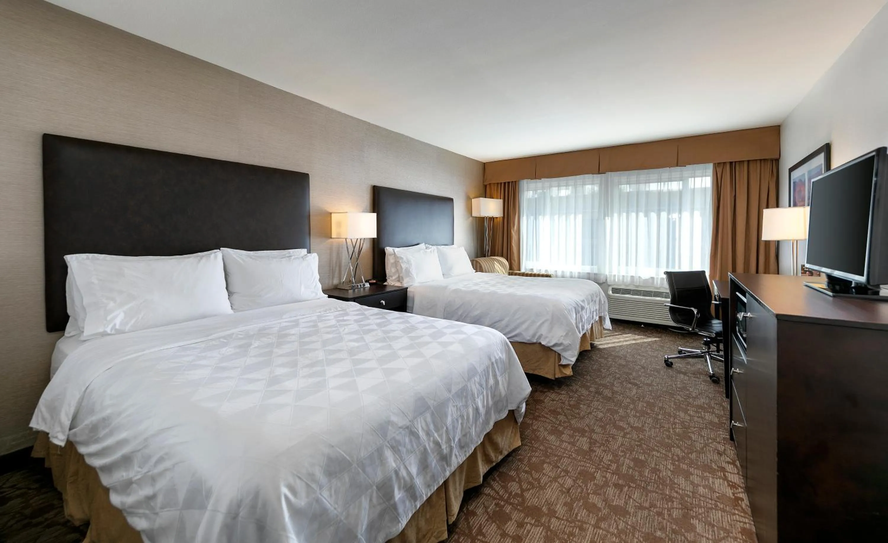 Bed in Pacific Stay Hotel