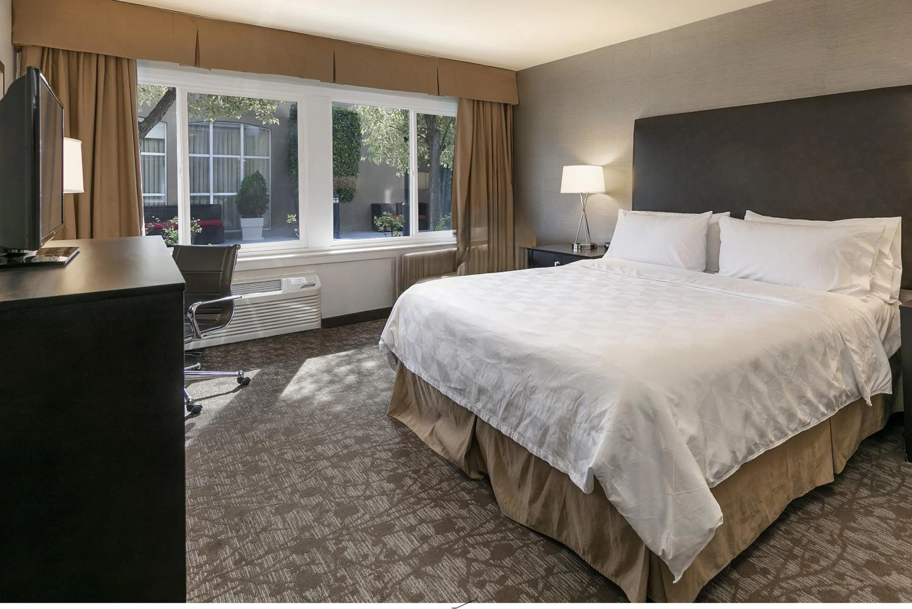 Bed in Pacific Stay Hotel