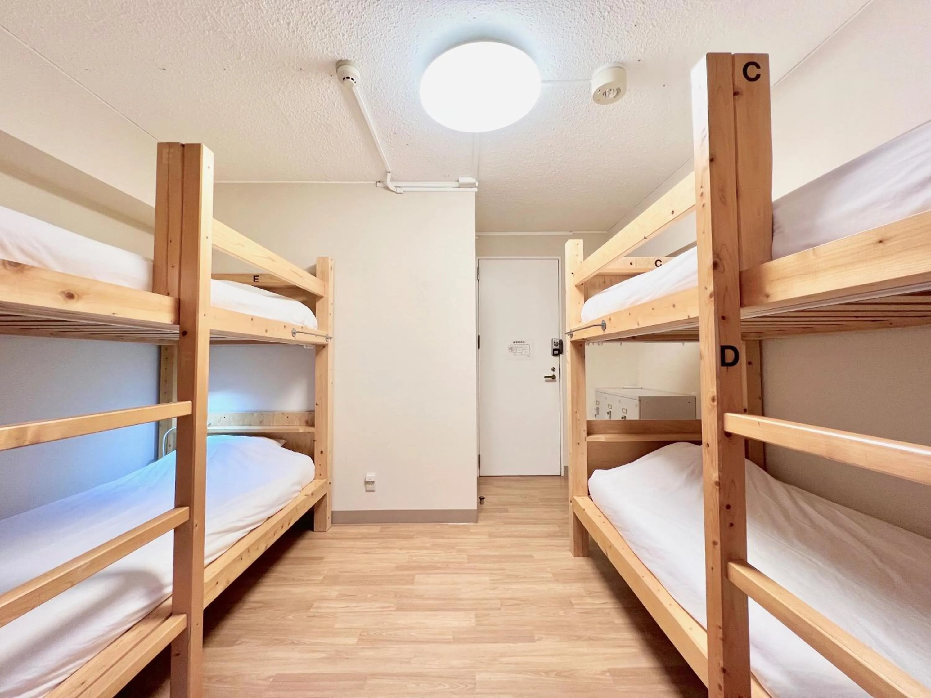 Photo of the whole room, Bed in Glocal Nagoya Backpackers Hostel