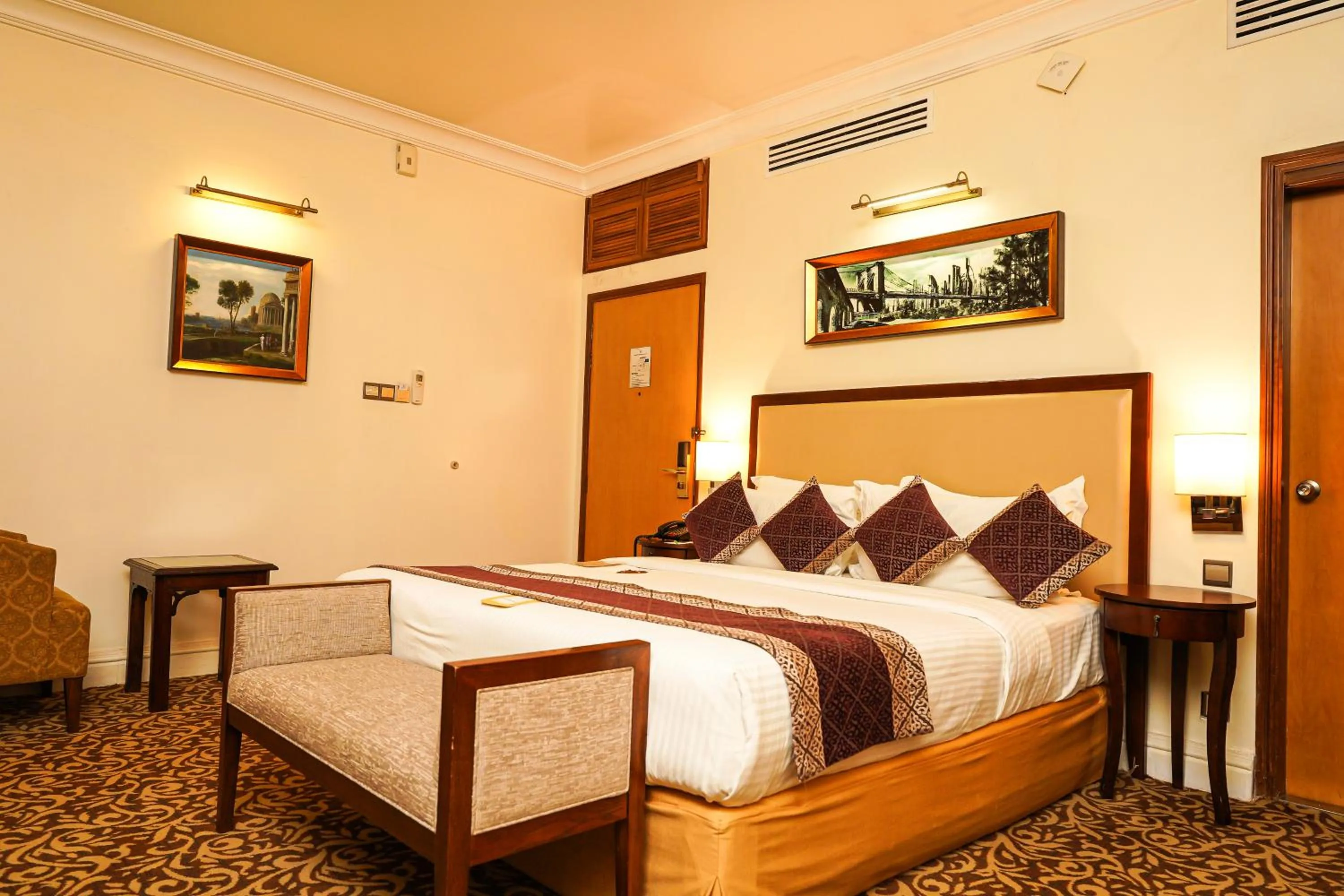 Bed in Royal Park Residence Hotel
