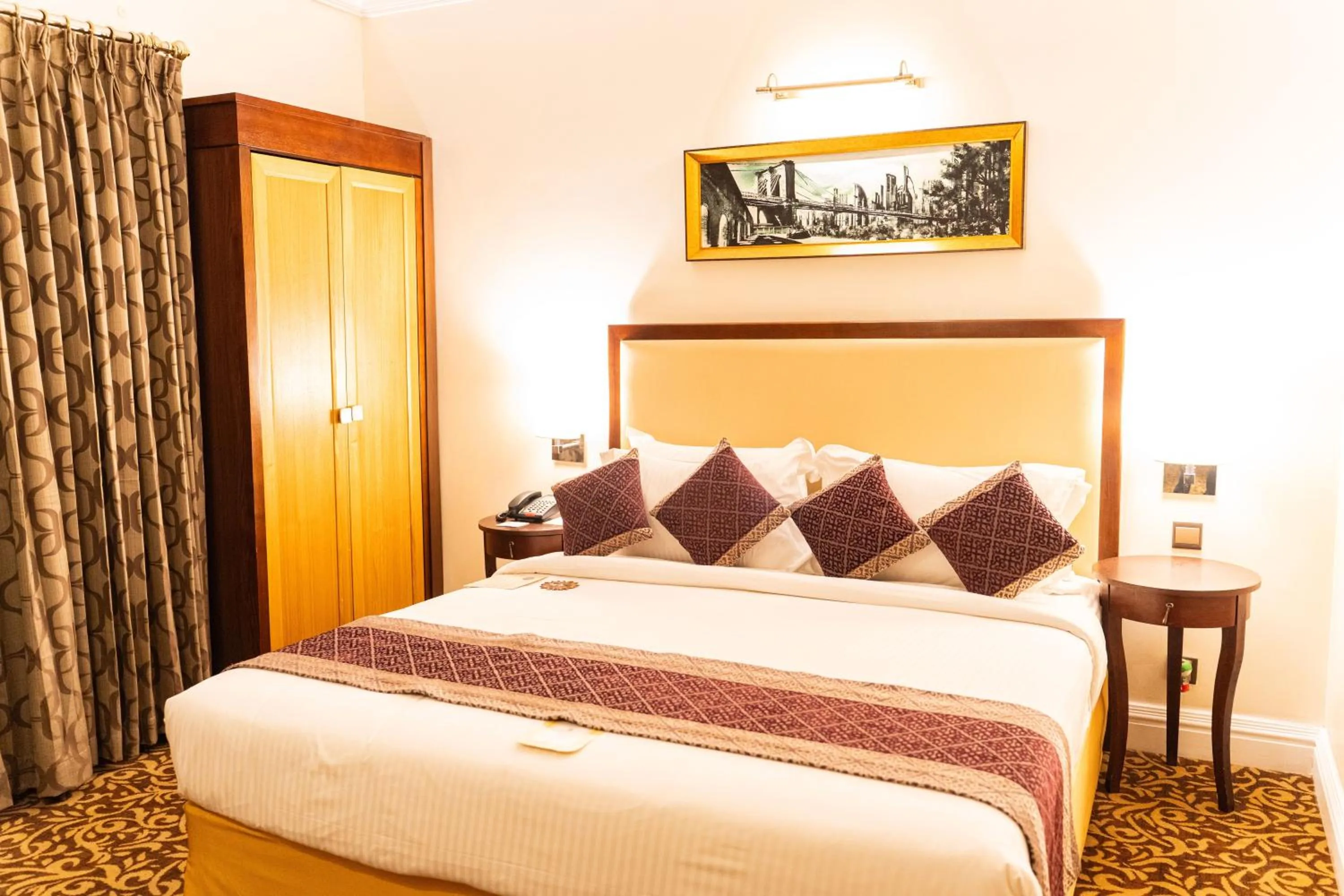 Bed in Royal Park Residence Hotel