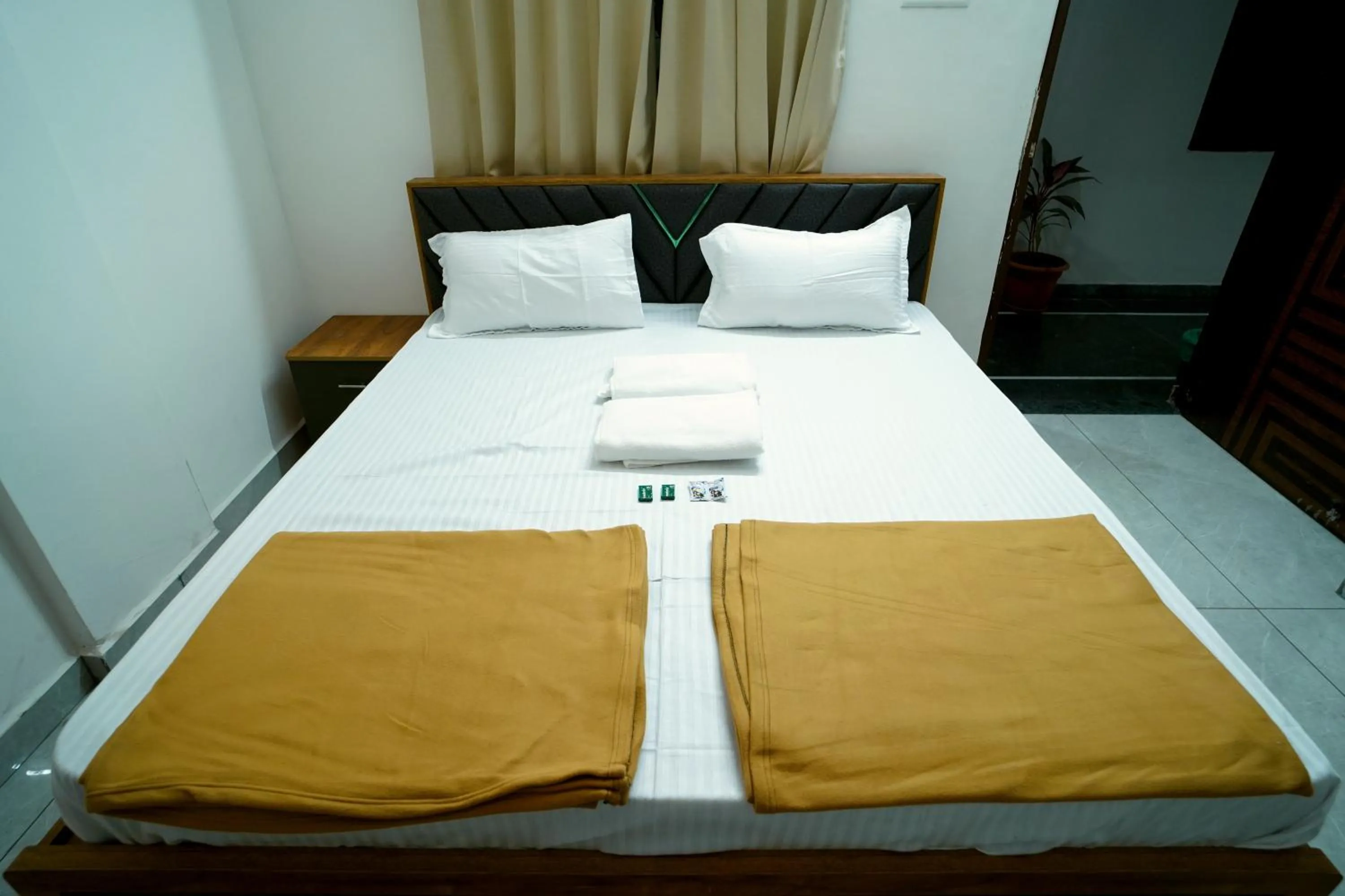 Bed in Hotel Pb Inn